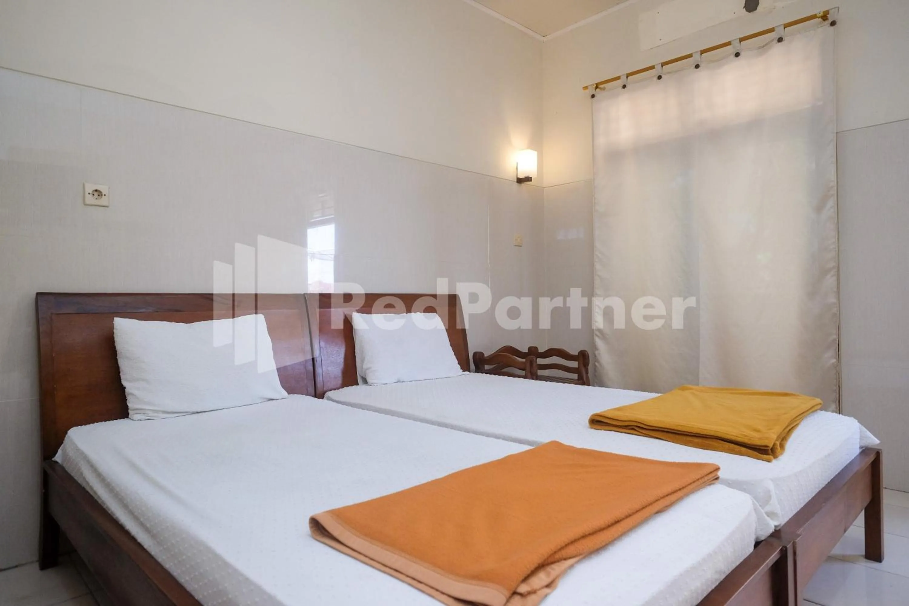 Bed in Wisma Garuda Syariah Condoongcatur Mitra RedDoorz