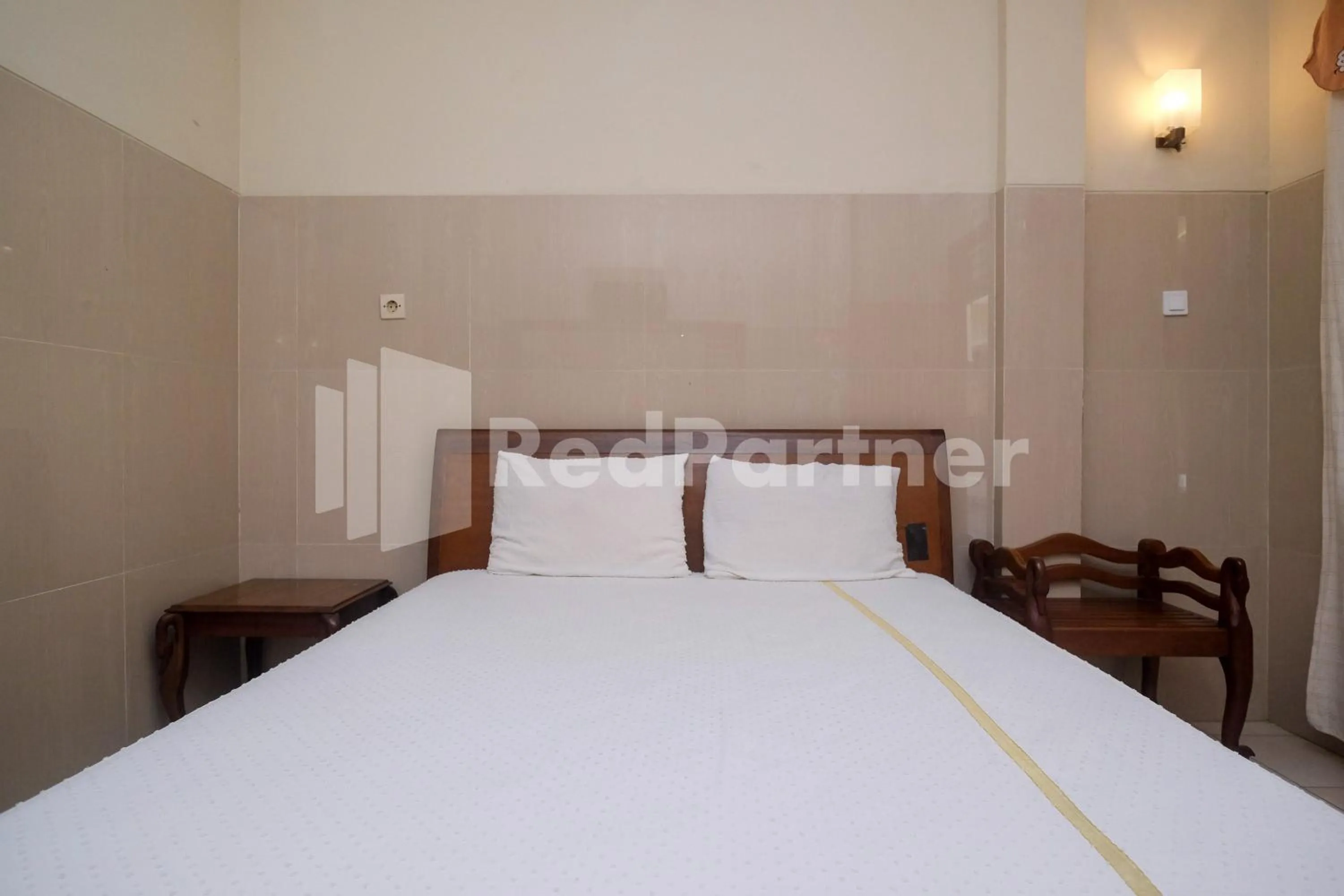 Bed in Wisma Garuda Syariah Condoongcatur Mitra RedDoorz