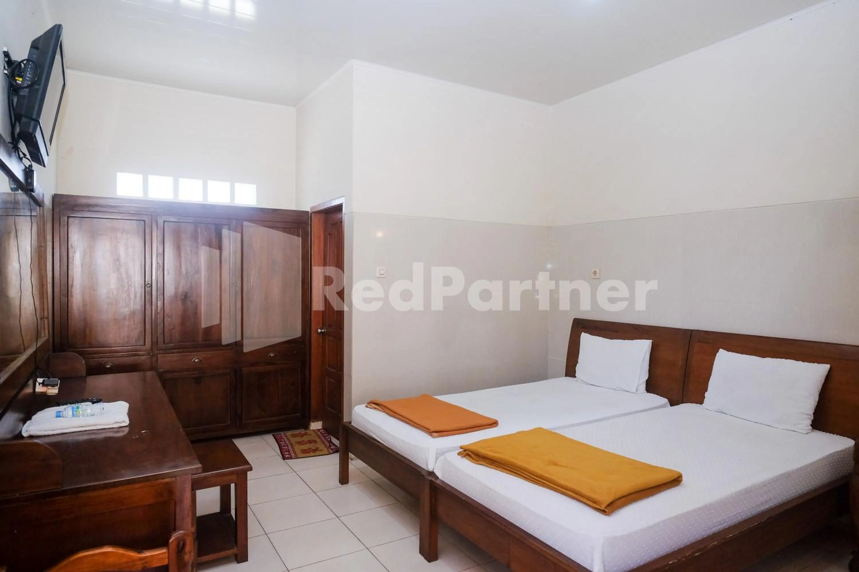 Bed in Wisma Garuda Syariah Condoongcatur Mitra RedDoorz