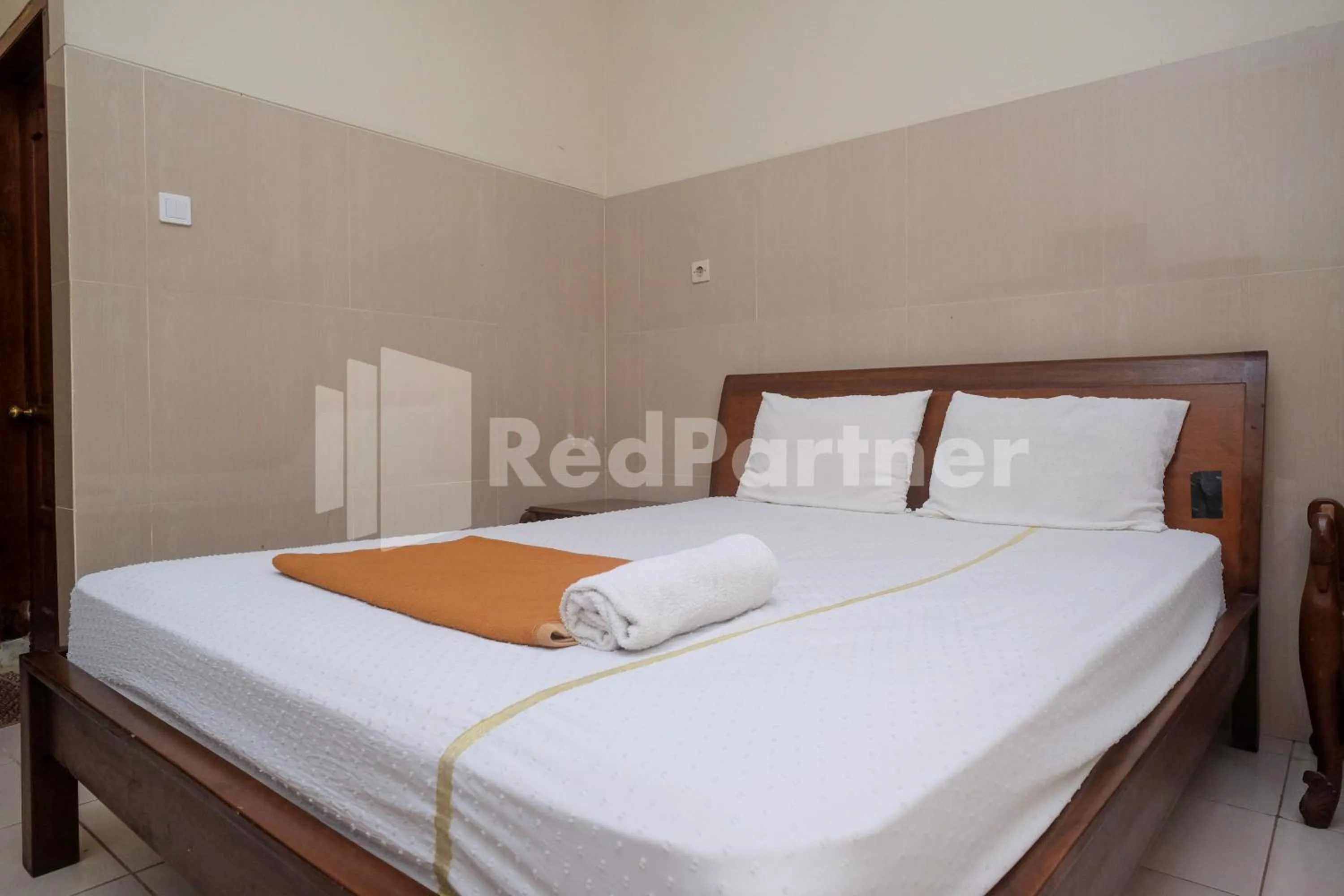 Bed in Wisma Garuda Syariah Condoongcatur Mitra RedDoorz