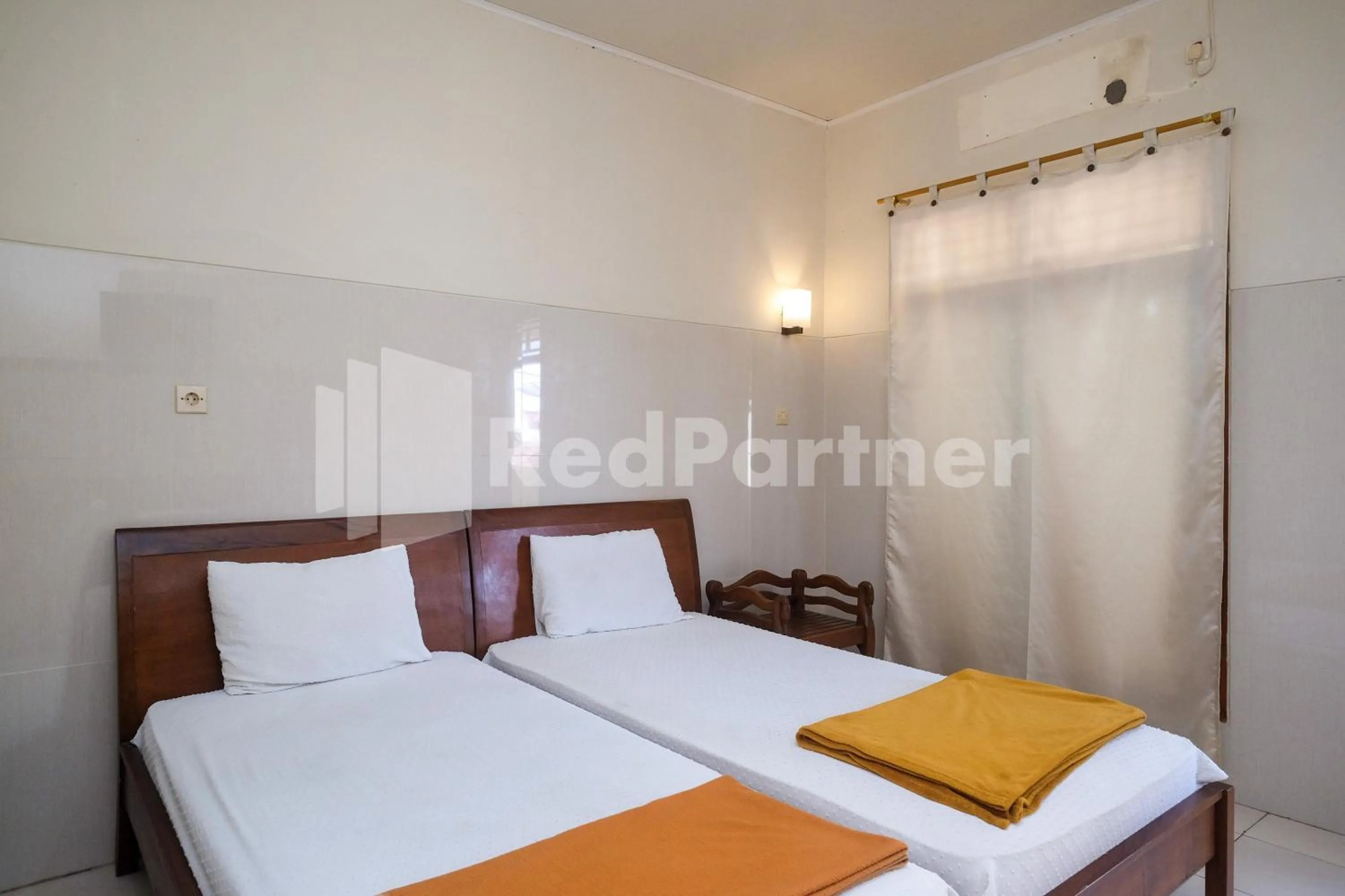 Bed in Wisma Garuda Syariah Condoongcatur Mitra RedDoorz