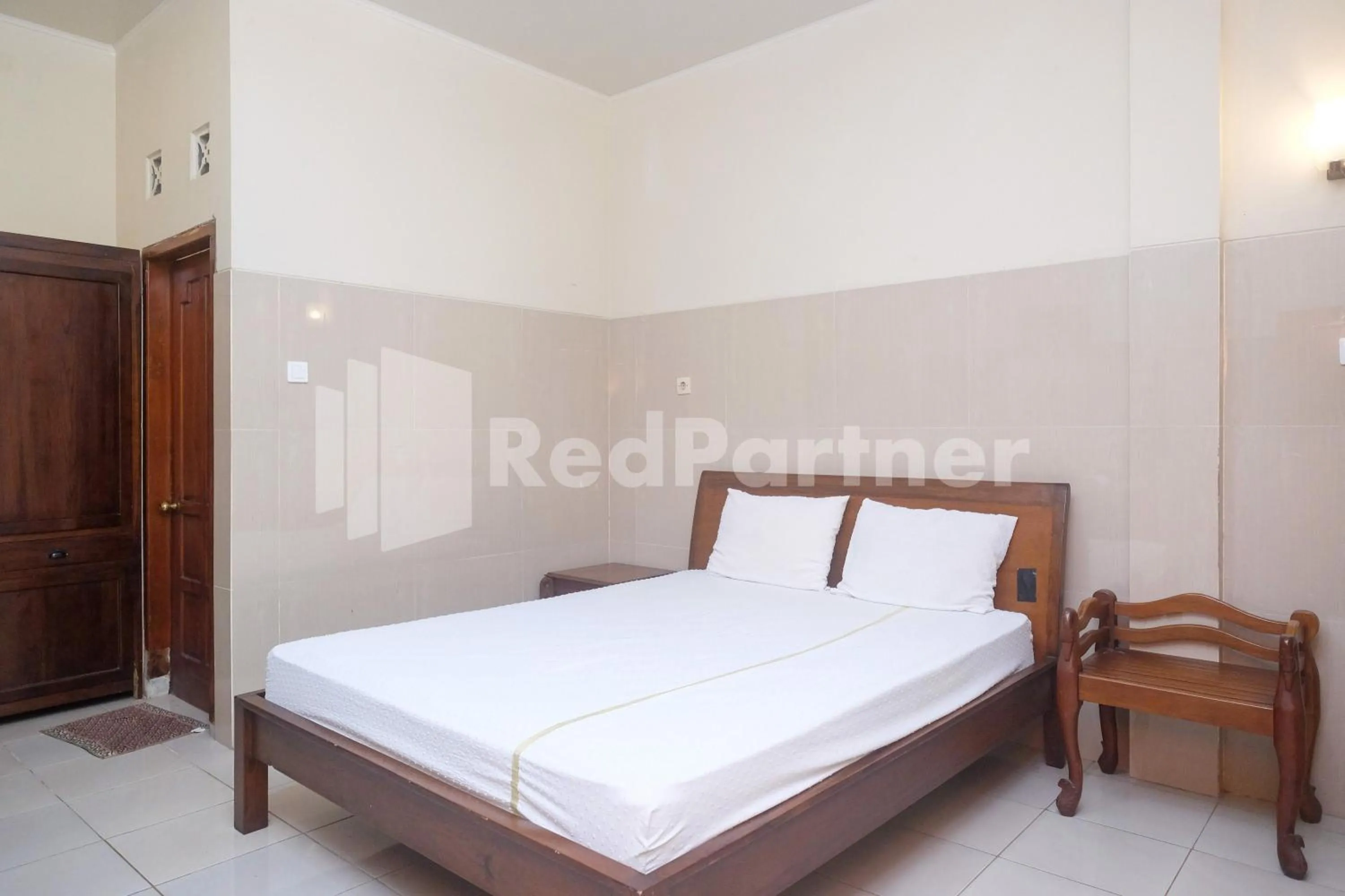 Bed in Wisma Garuda Syariah Condoongcatur Mitra RedDoorz
