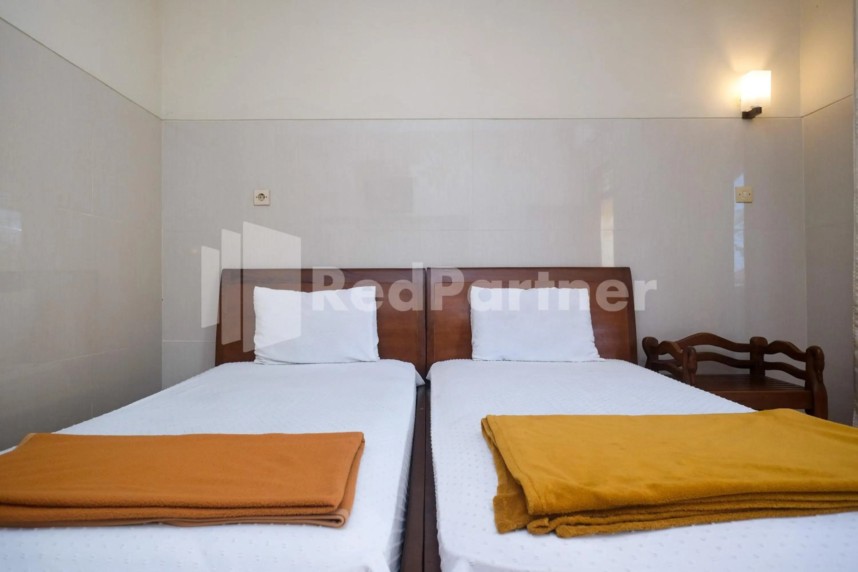 Bed in Wisma Garuda Syariah Condoongcatur Mitra RedDoorz