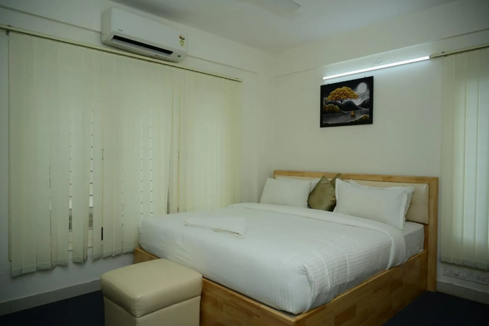 Bed in Windfall Service Apartment