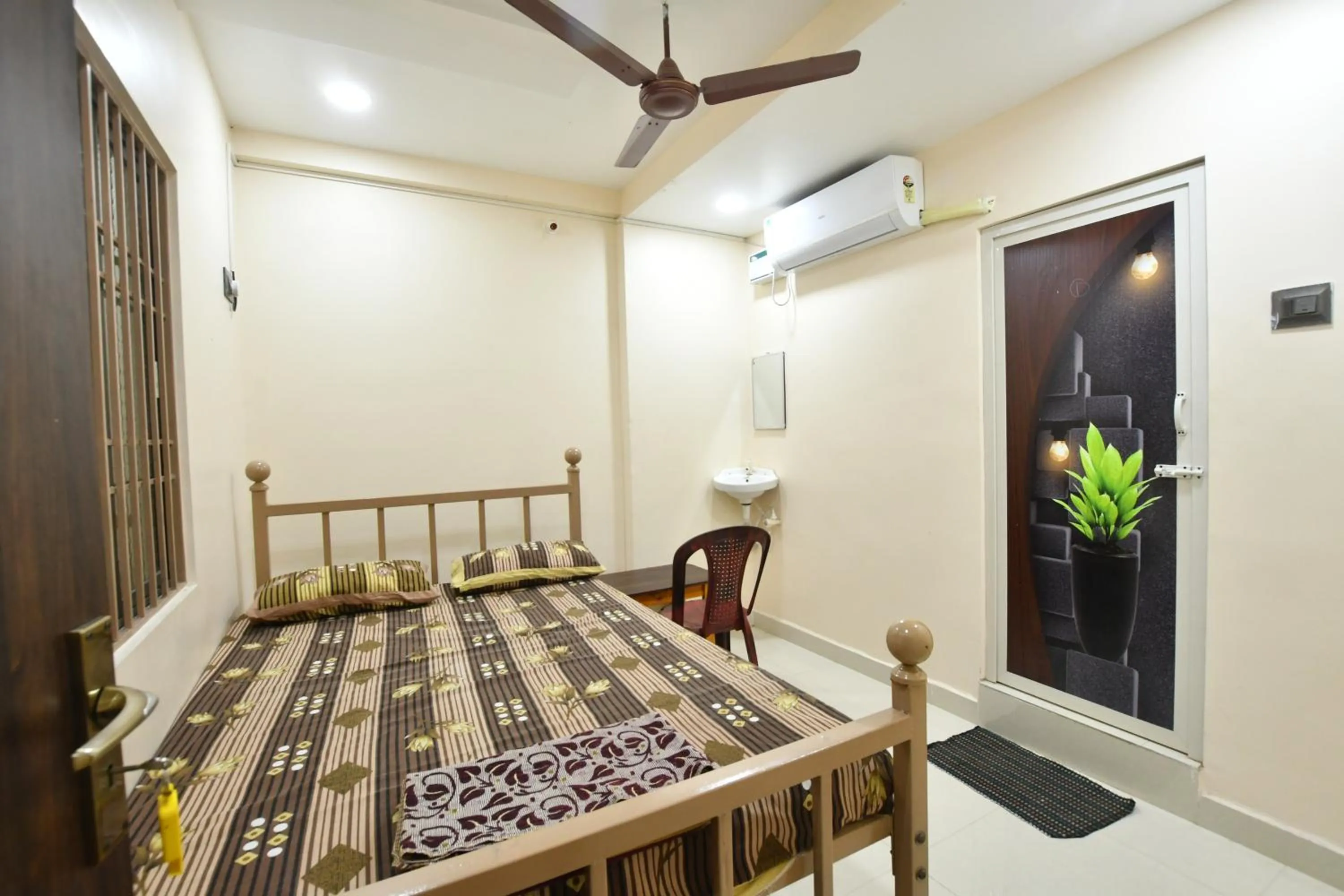 Photo of the whole room, Bed in VIJAY BALAJI MAHAL A/C