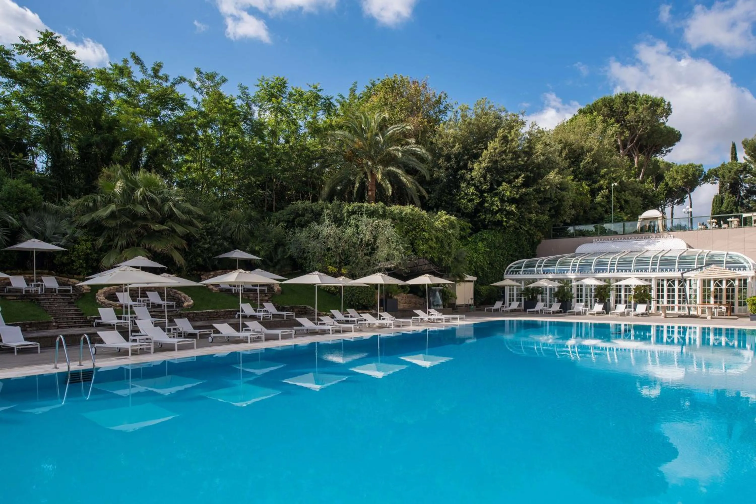 Pool view in Rome Cavalieri, A Waldorf Astoria Hotel
