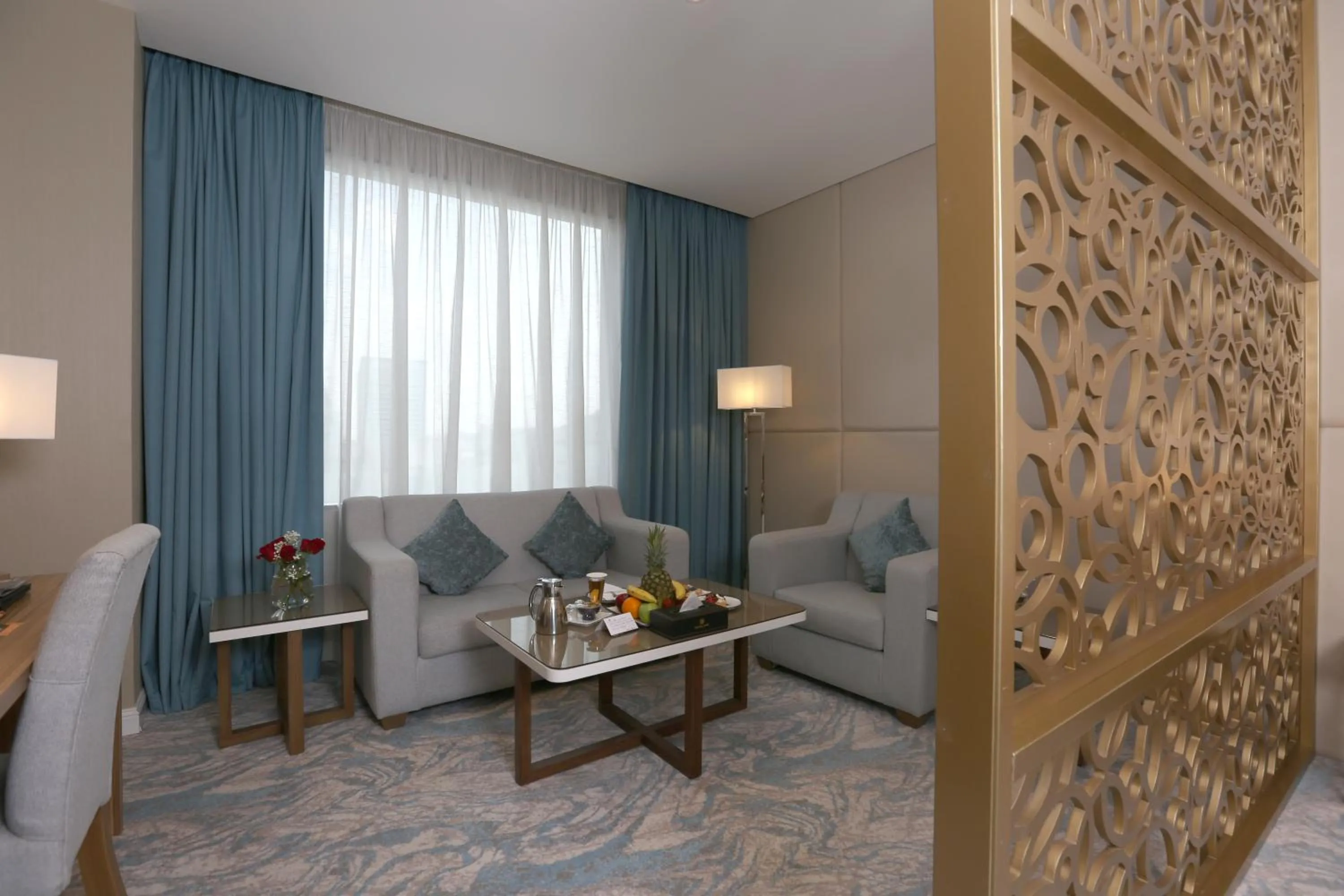 Seating area in Cantonal Hotel by Warwick