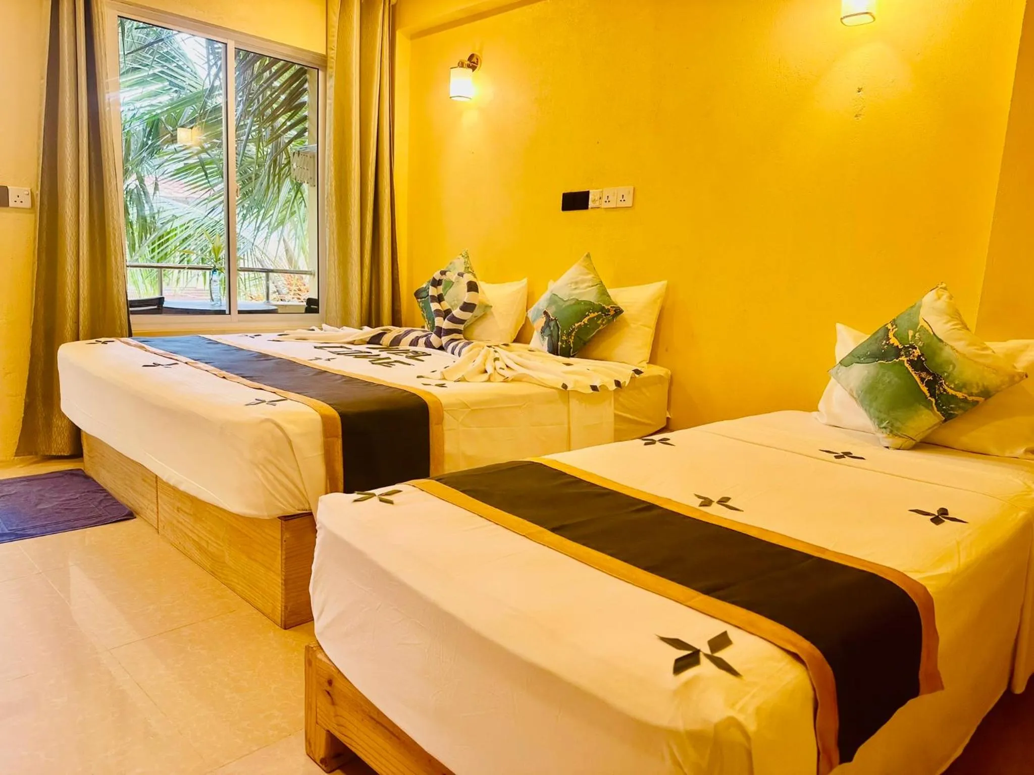 Deluxe Triple Room in Sorenzo Maldives