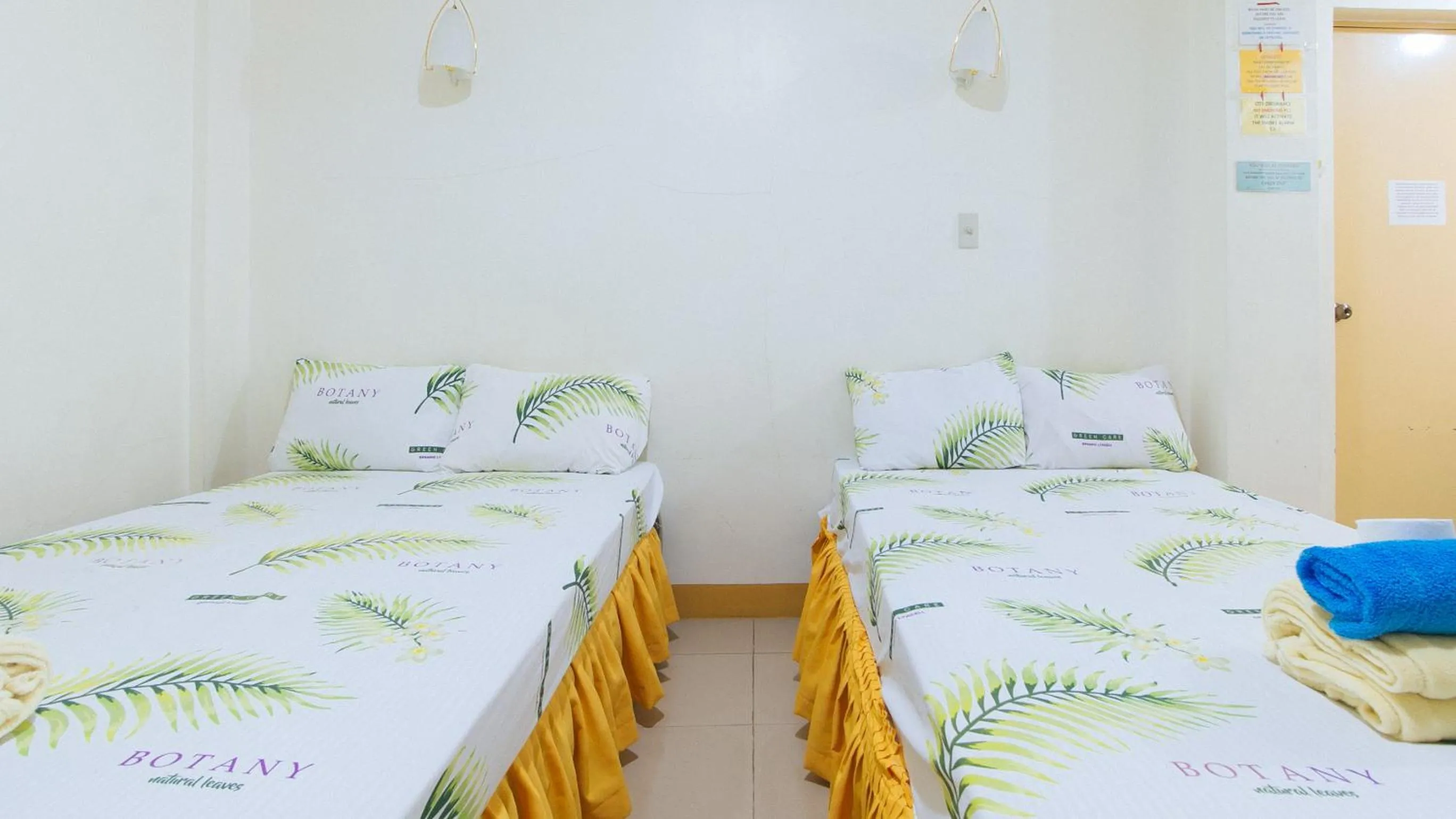 Bed in Golden Sunrise Hotel I by RedDoorz