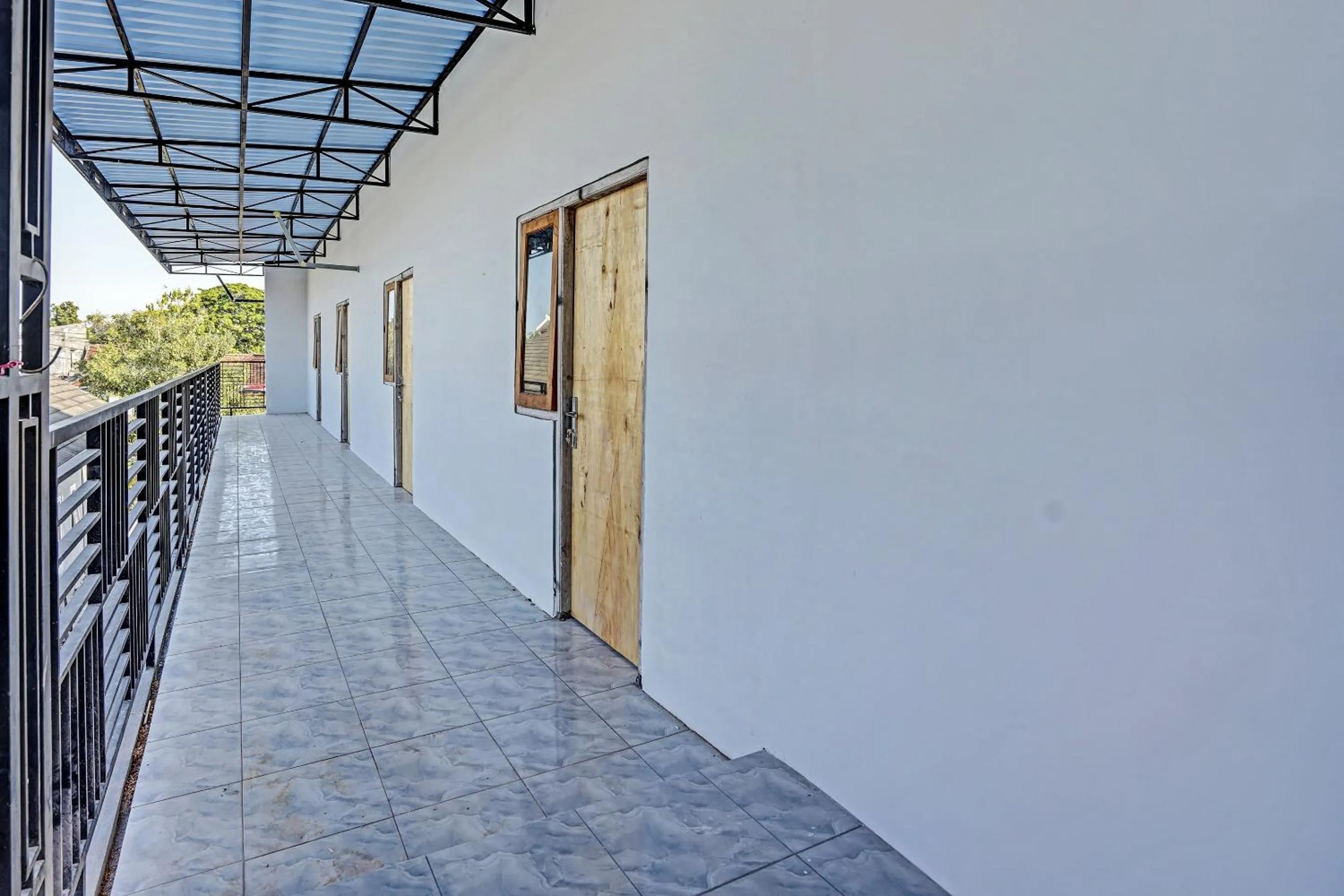 Lobby or reception in OYO LIFE 91594 Bungah Residence Syariah