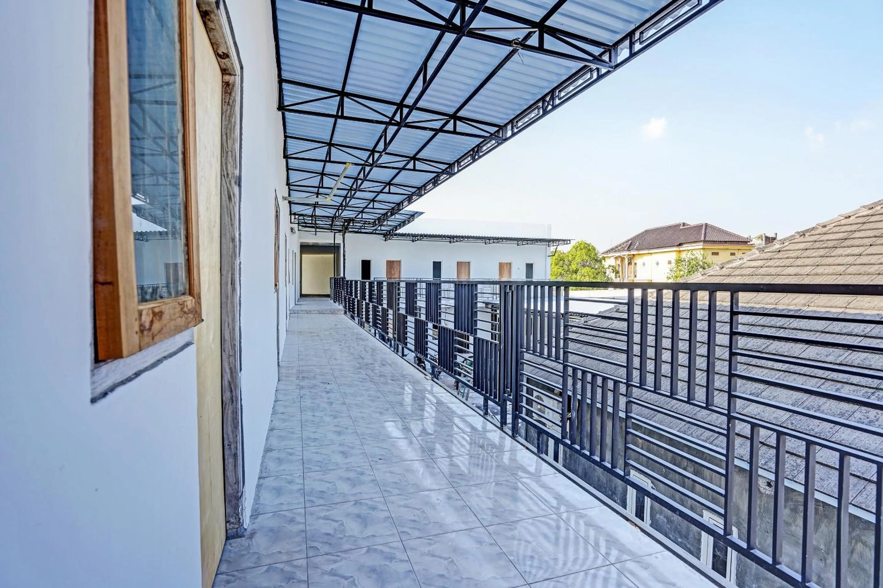 Lobby or reception in OYO LIFE 91594 Bungah Residence Syariah