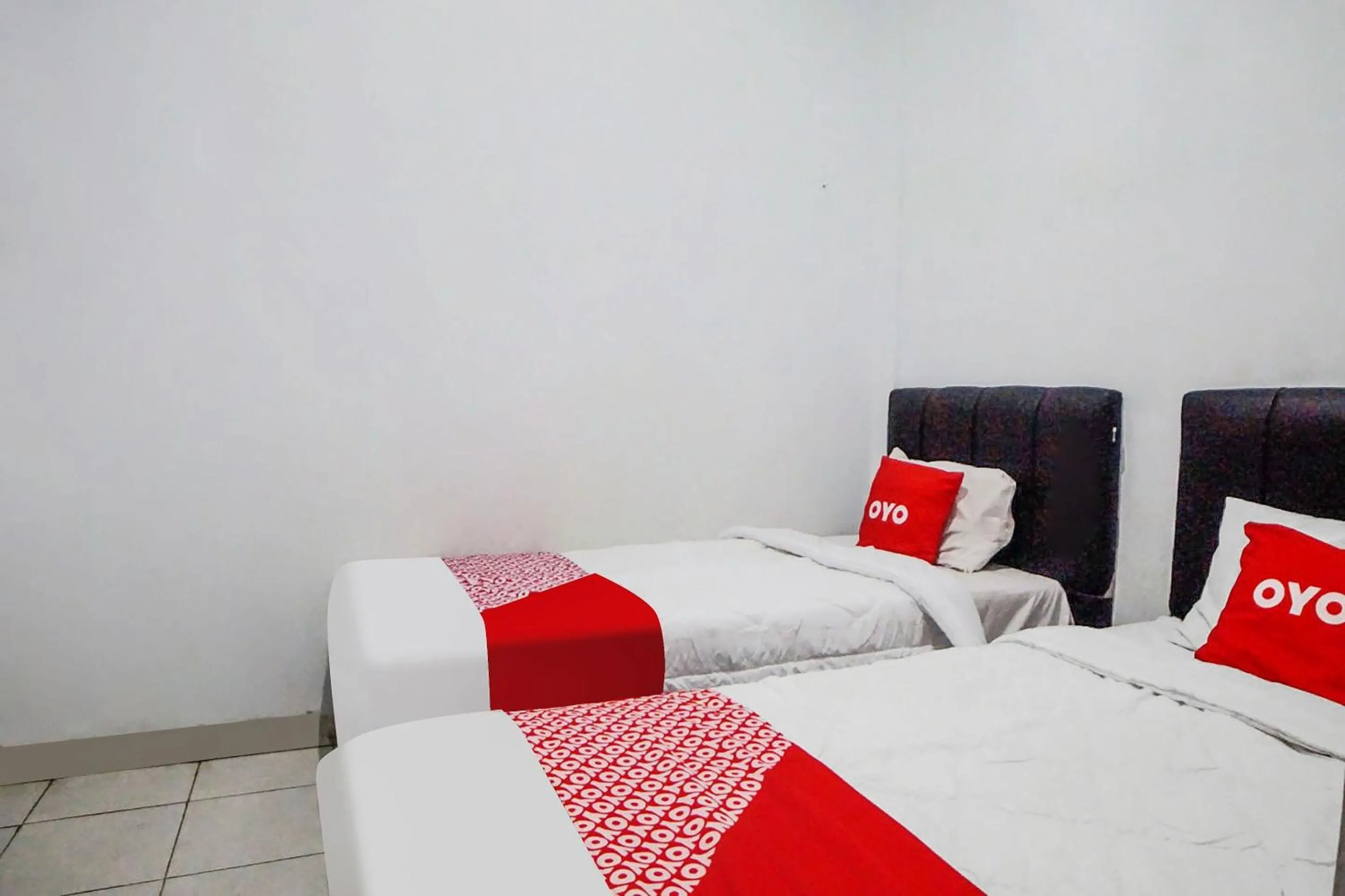 Bedroom, Bed in Hotel O Wika Wiki Homestay