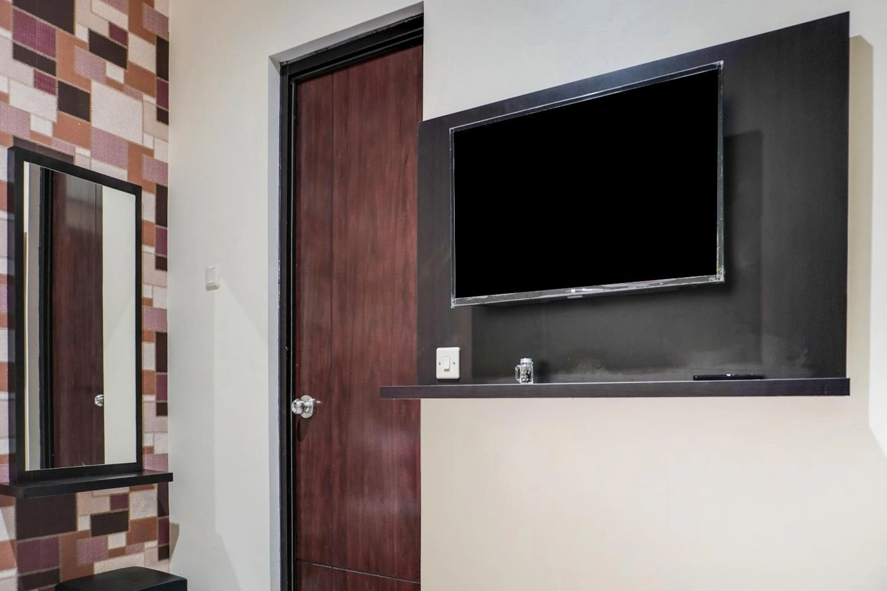 Bedroom in OYO 91646 fio colombus residence