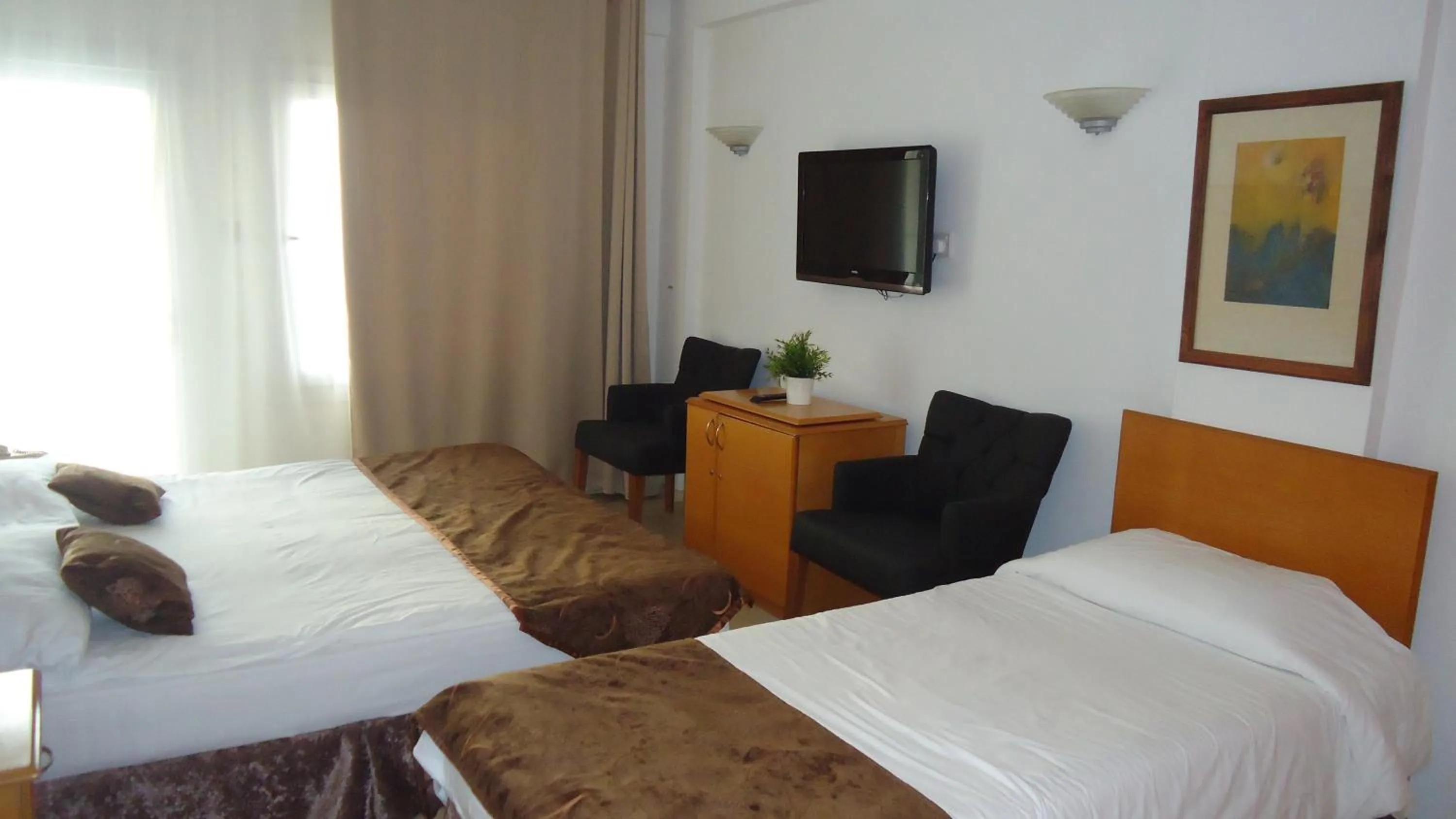 Photo of the whole room, Bed in Ada Beach Hotel