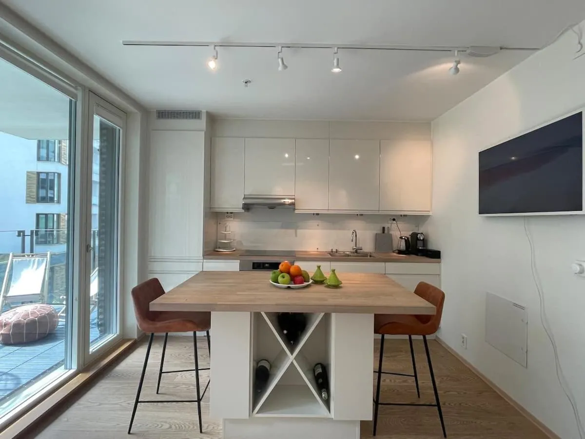TV and multimedia in Bright & exclusive 1BR in Prime Location, located on water in Oslo center with see view to Oslo fjord