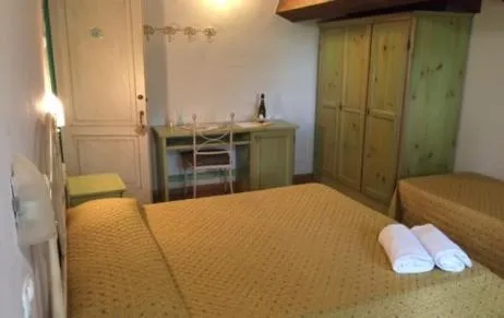 Photo of the whole room, Bed in Tenuta La Lupa