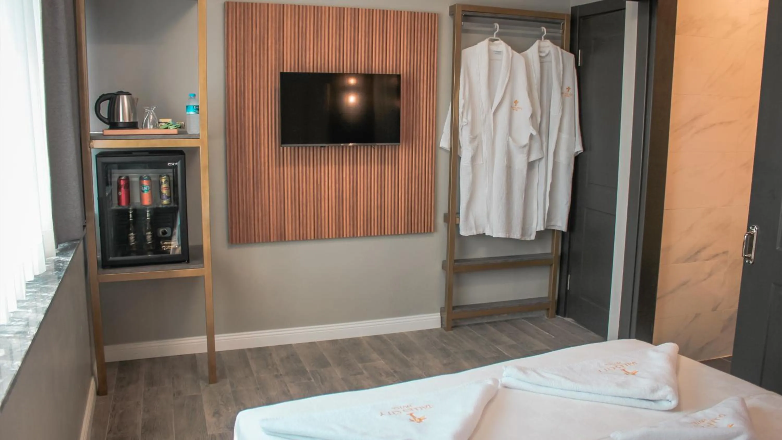 Bed in TALLES CITY HOTEL