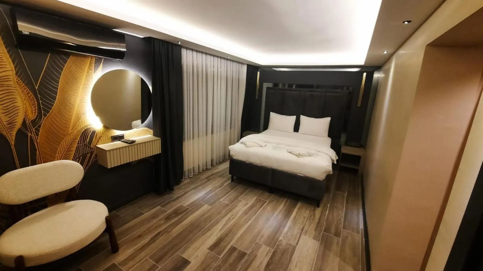 Bed in TALLES CITY HOTEL