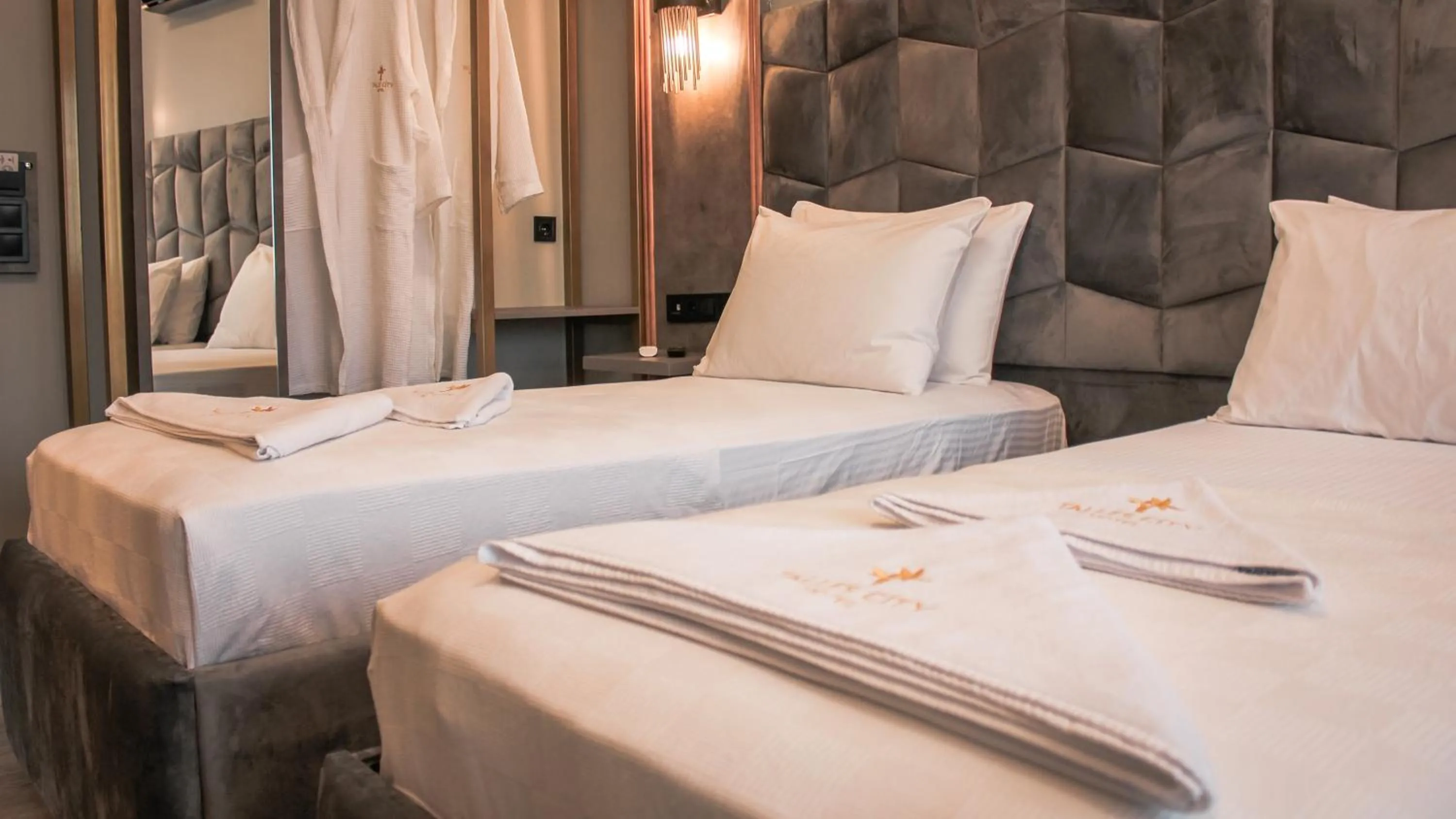 Bed in TALLES CITY HOTEL