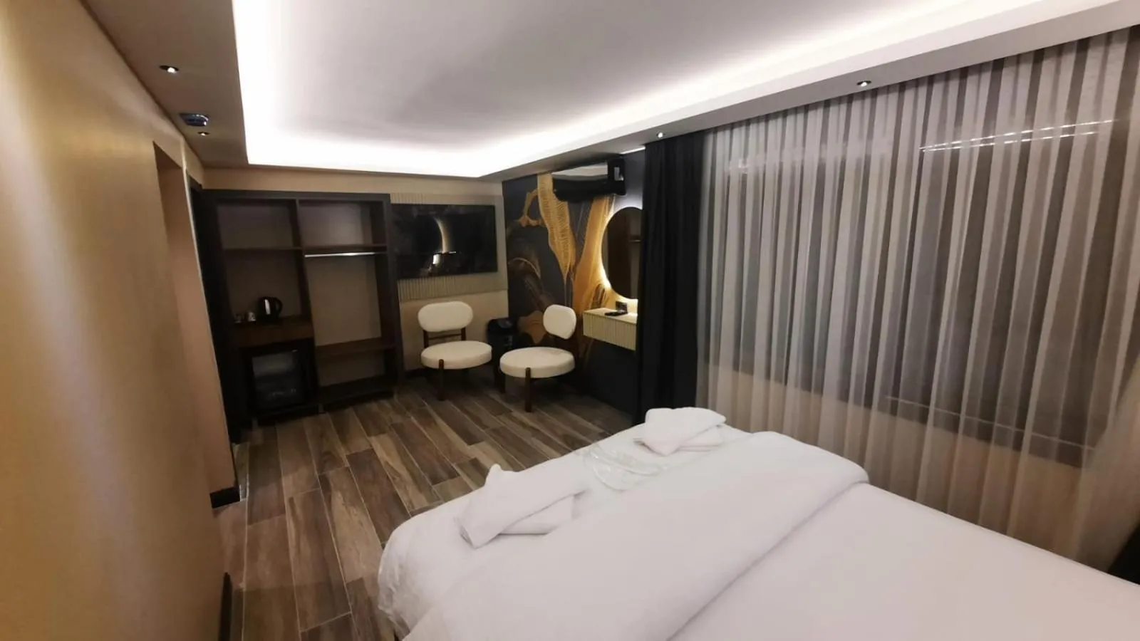 Bed in TALLES CITY HOTEL