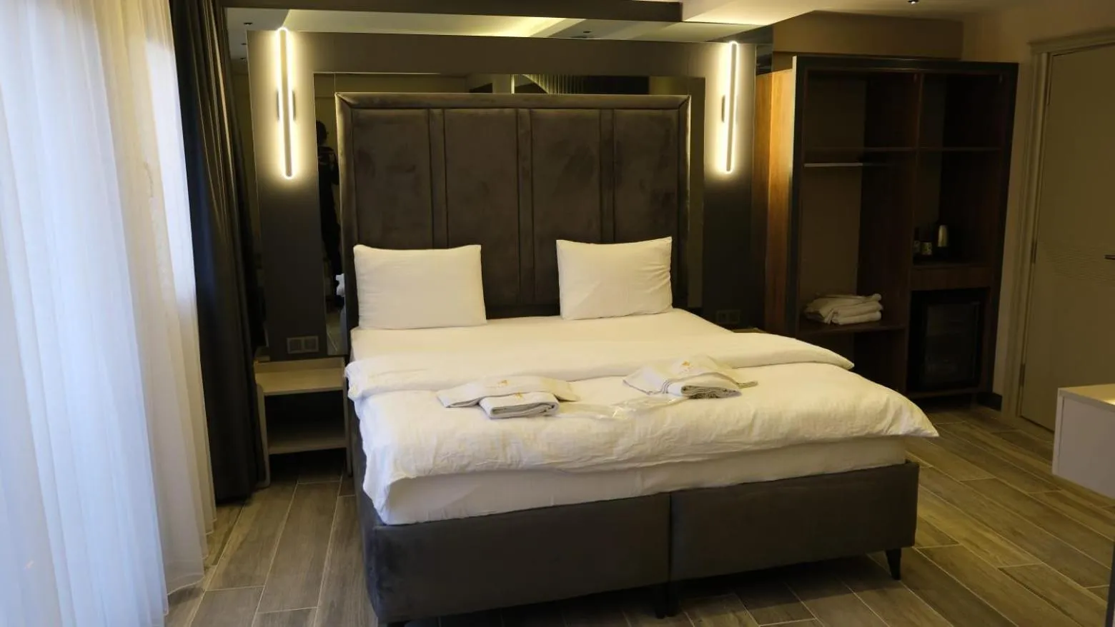 Bed in TALLES CITY HOTEL
