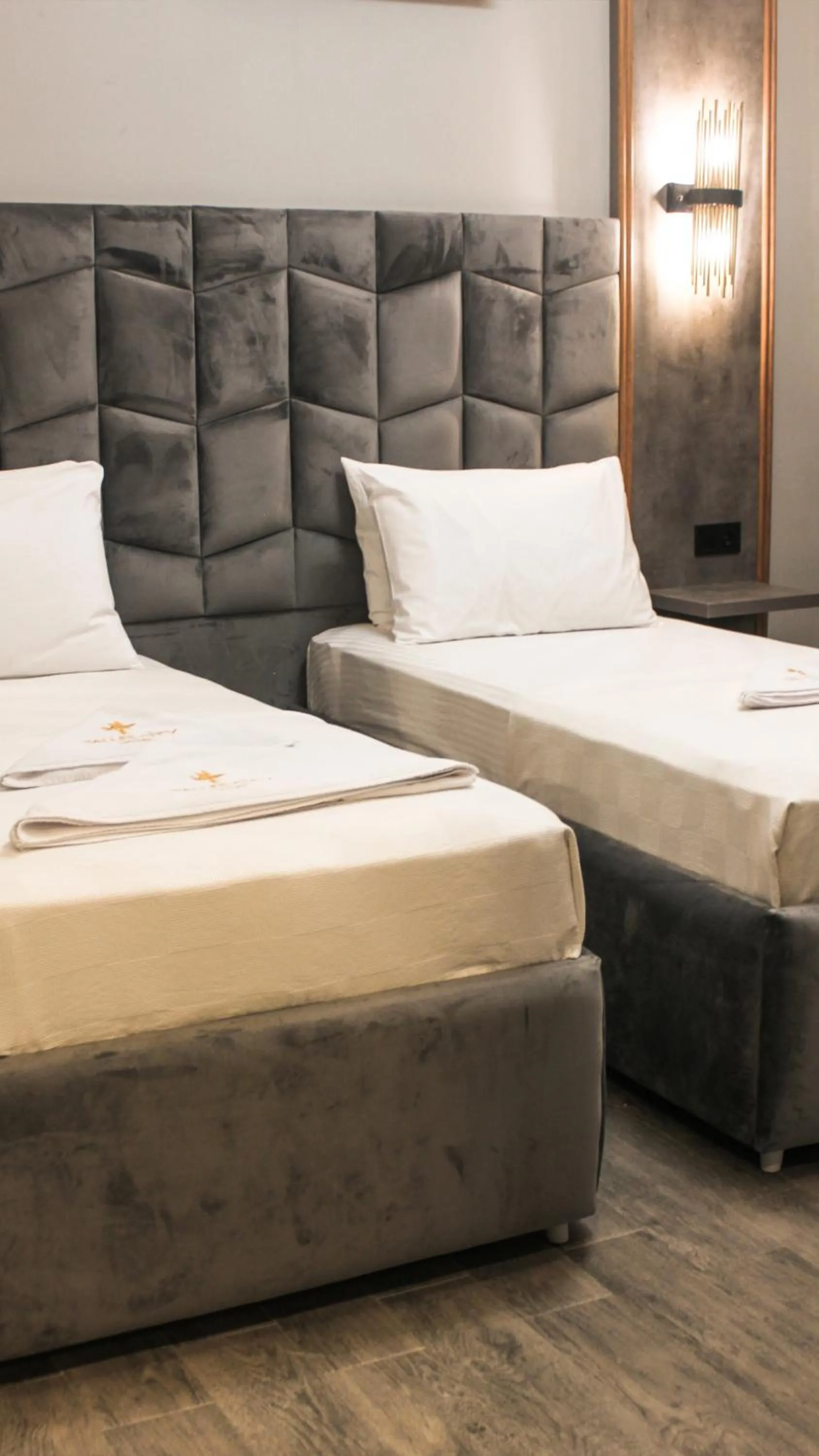 Bed in TALLES CITY HOTEL