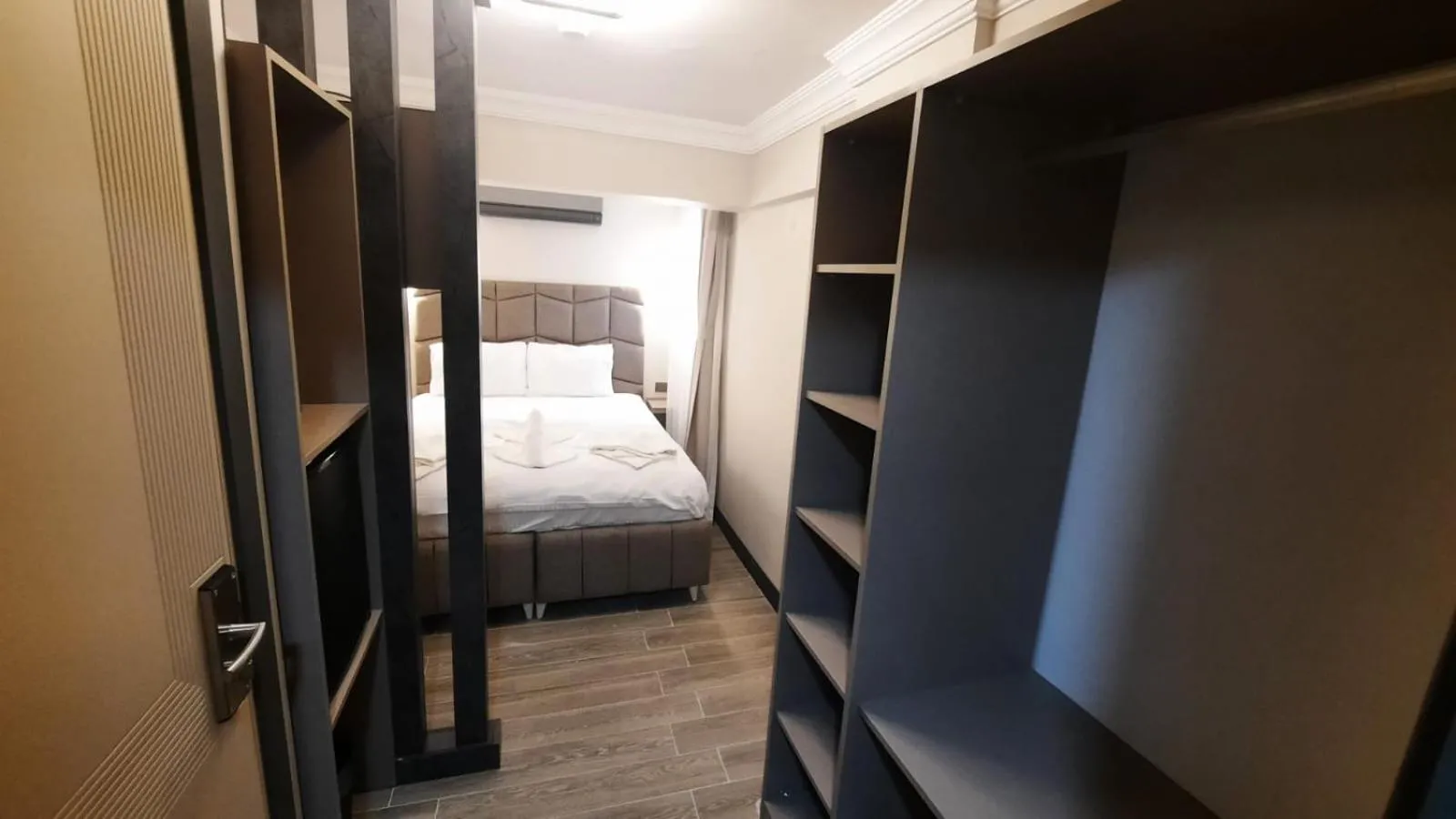 Bed in TALLES CITY HOTEL