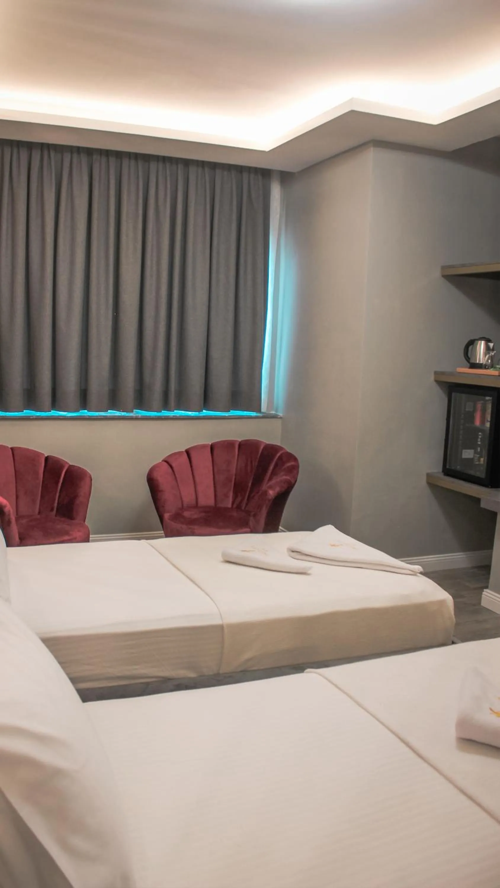 Bed in TALLES CITY HOTEL