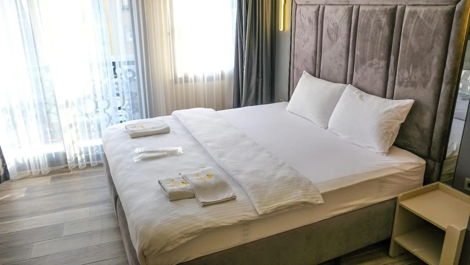 Bed in TALLES CITY HOTEL