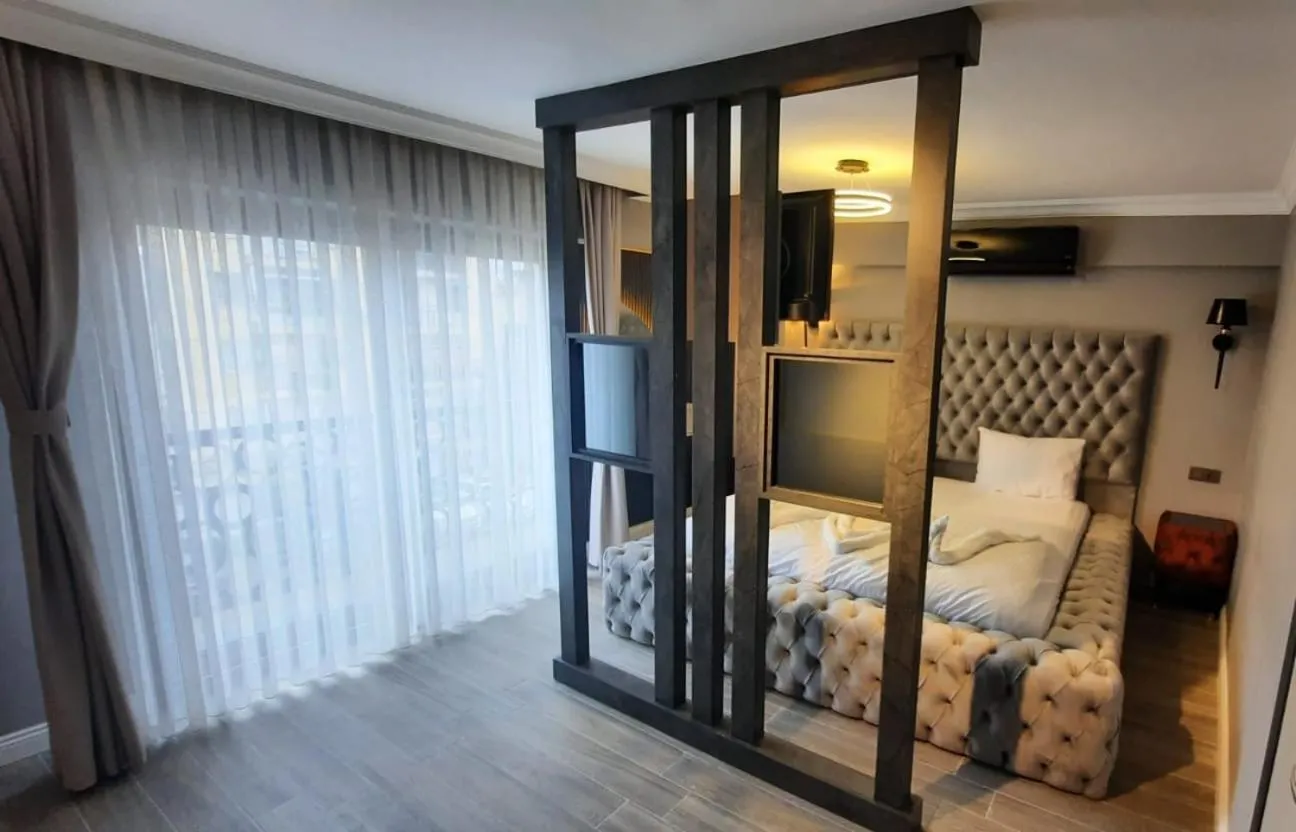 Bed in TALLES CITY HOTEL