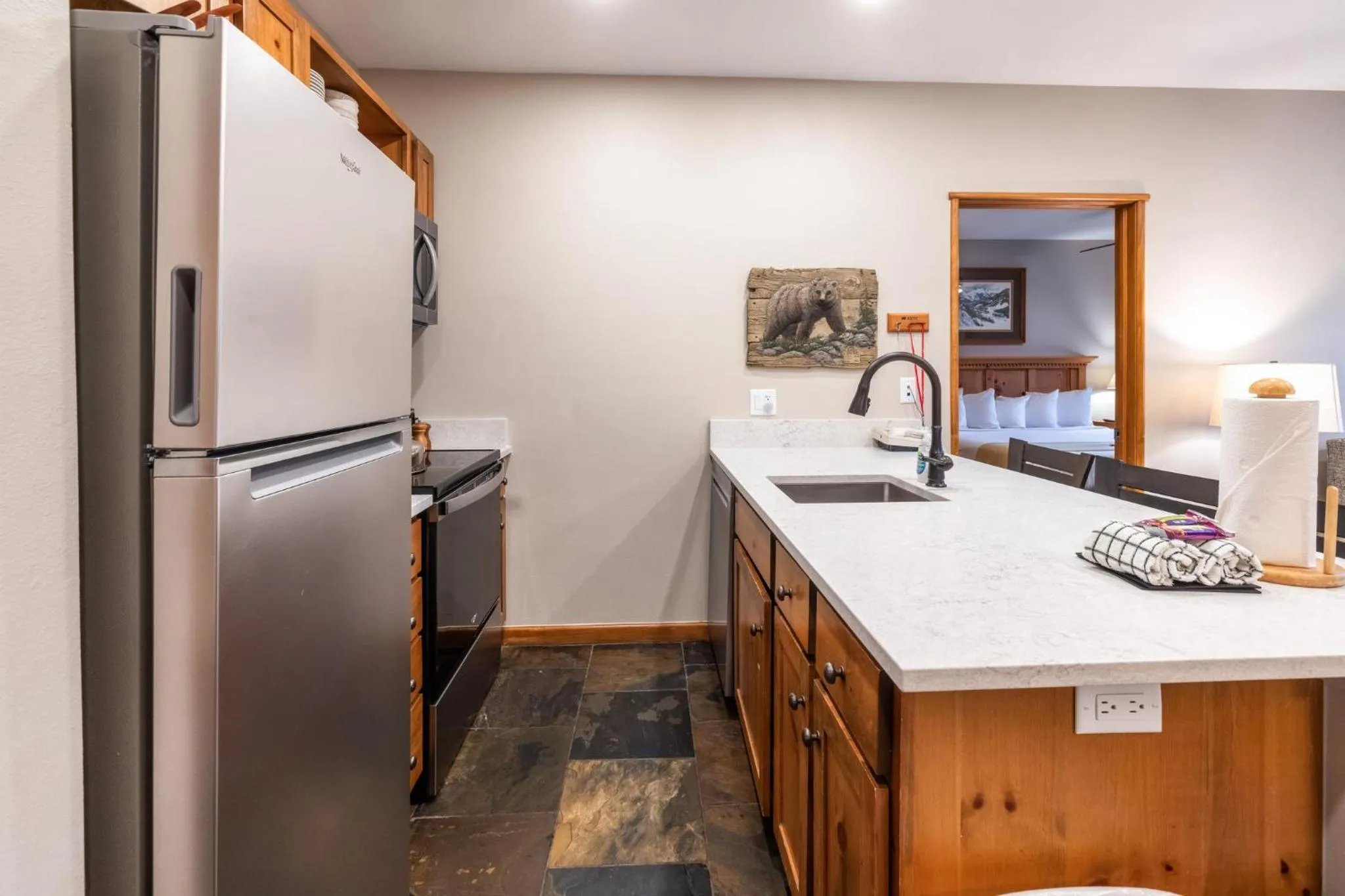 Communal kitchen in Jackpine & Black Bear Condos by Vail Resorts