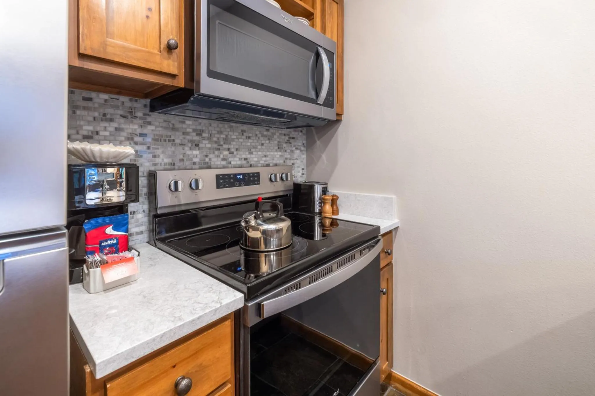 Communal kitchen in Jackpine & Black Bear Condos by Vail Resorts