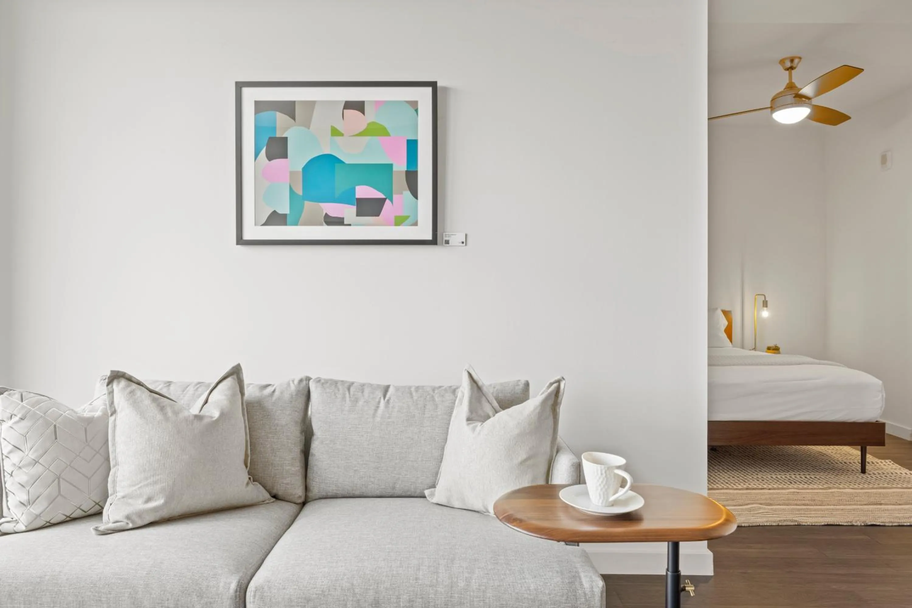 Living room, Bed in Placemakr Marymount Ballston