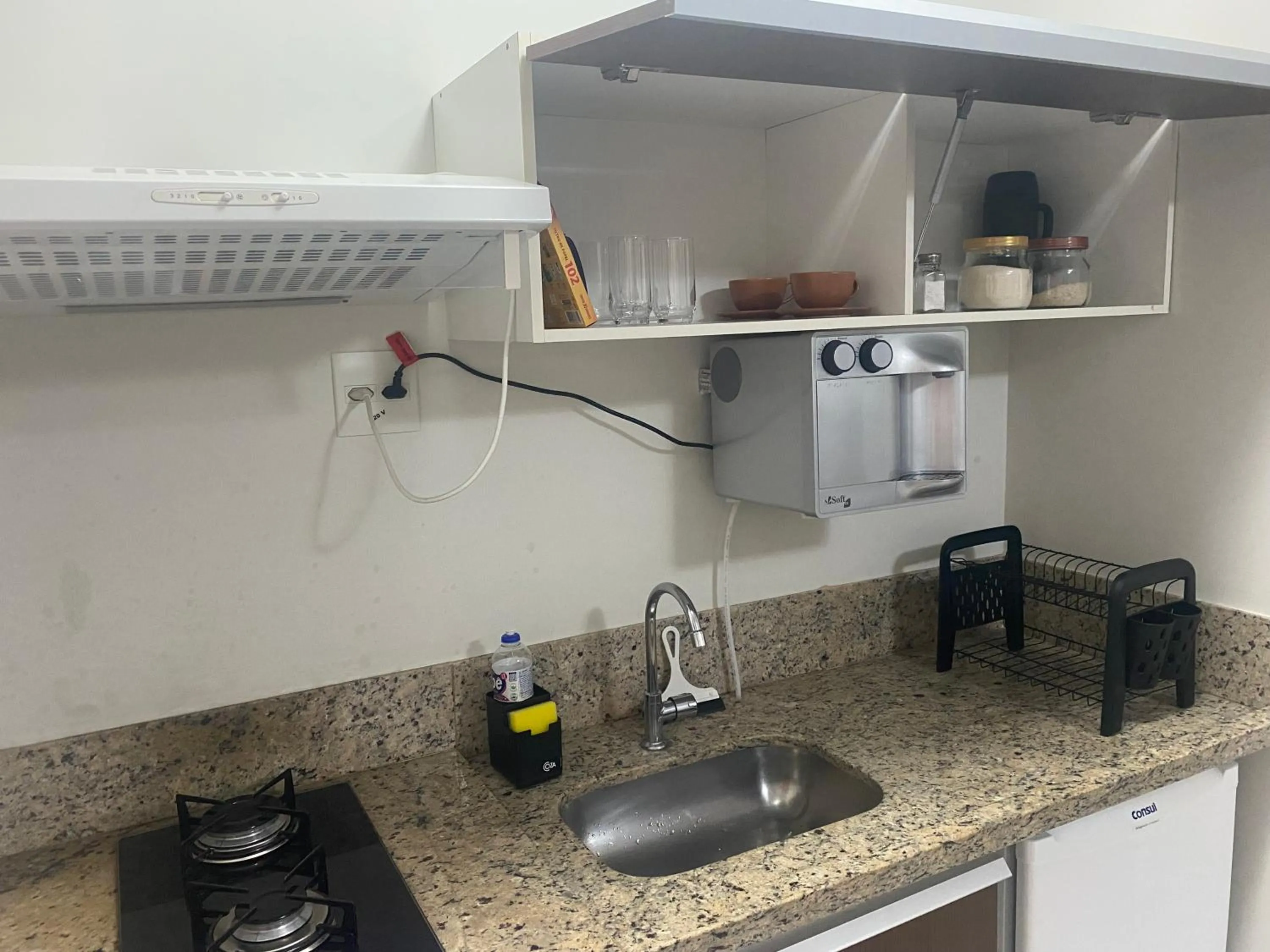 Kitchen or kitchenette in Prive Boulevard Suite Hotel