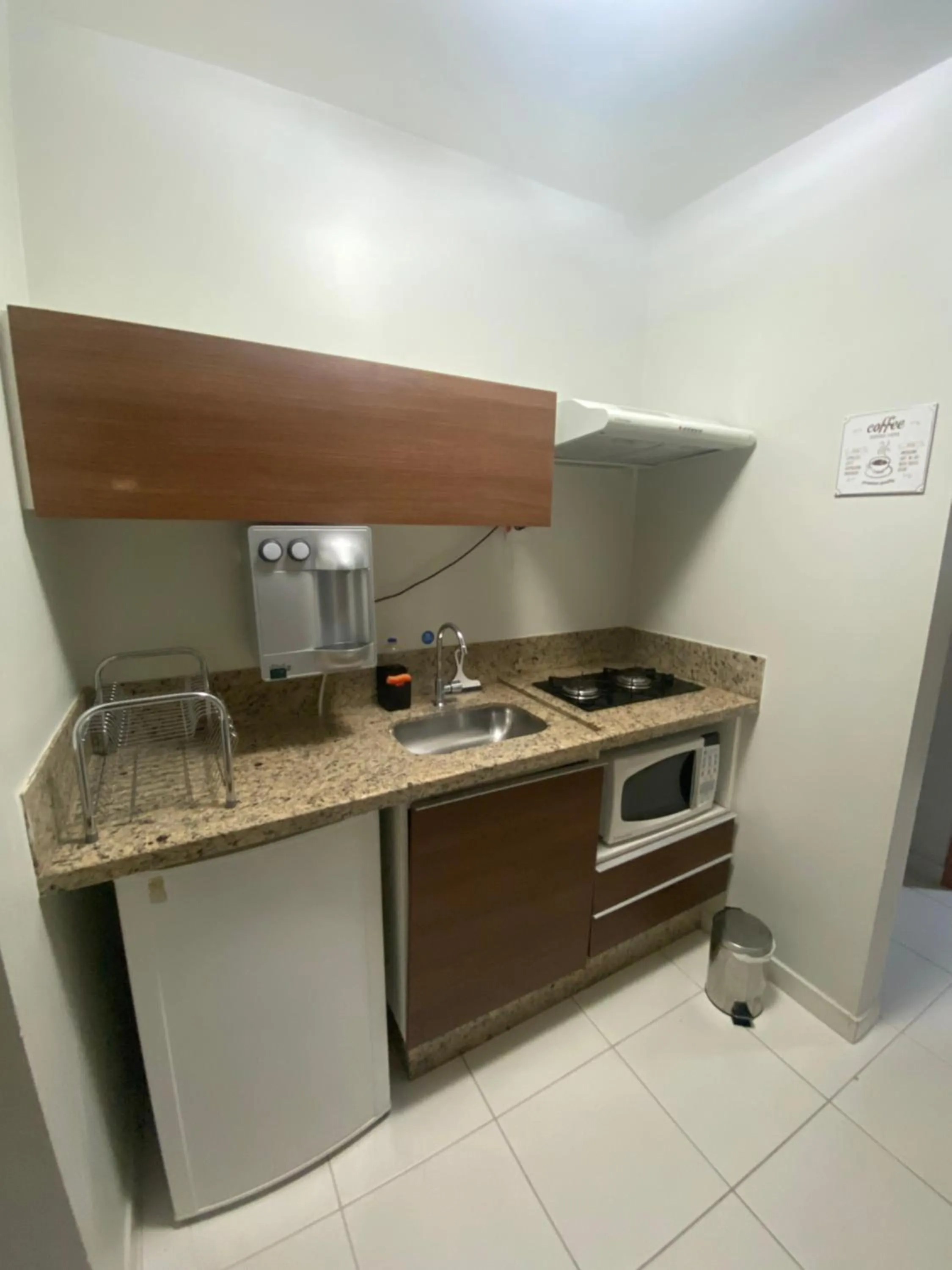 Kitchen or kitchenette in Prive Boulevard Suite Hotel