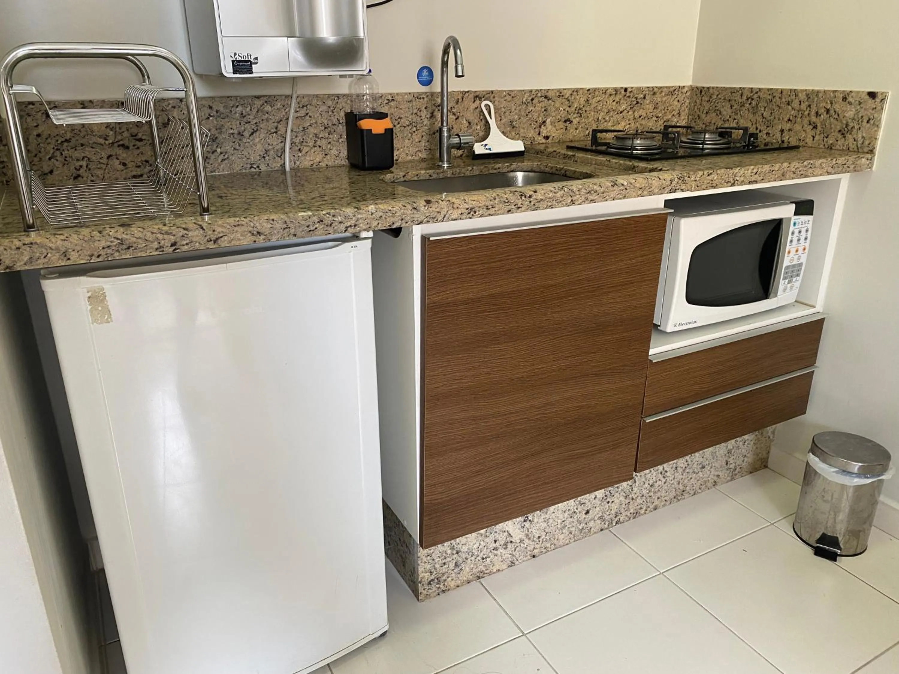 Kitchen or kitchenette in Prive Boulevard Suite Hotel