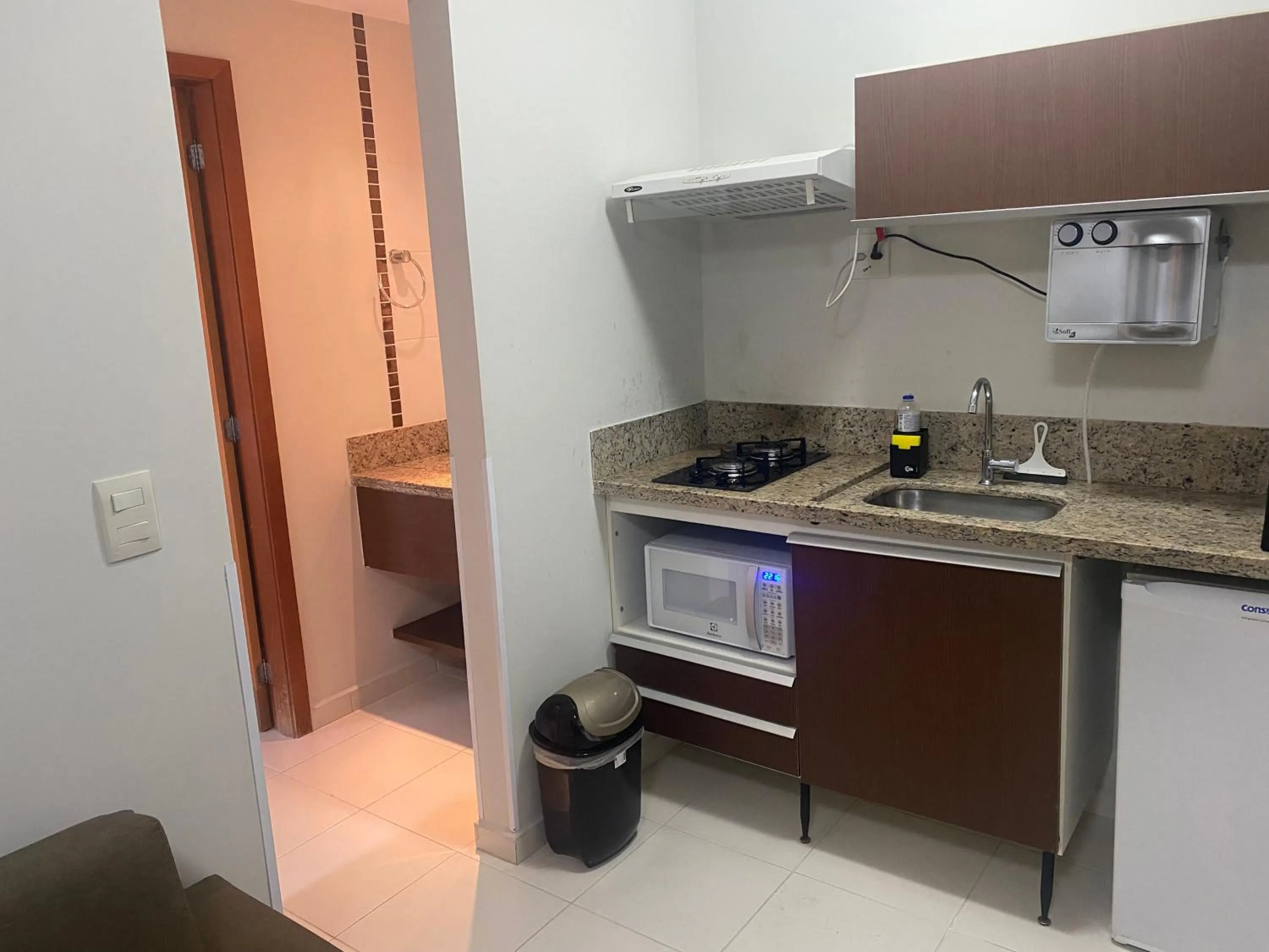 Kitchen or kitchenette in Prive Boulevard Suite Hotel