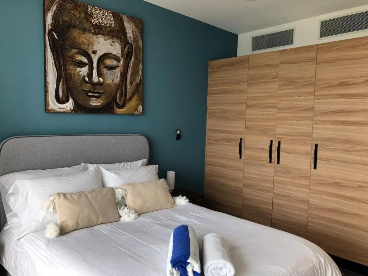 Bed in Deluxe Aparment Whit Beach & Ocean View 8 Pax