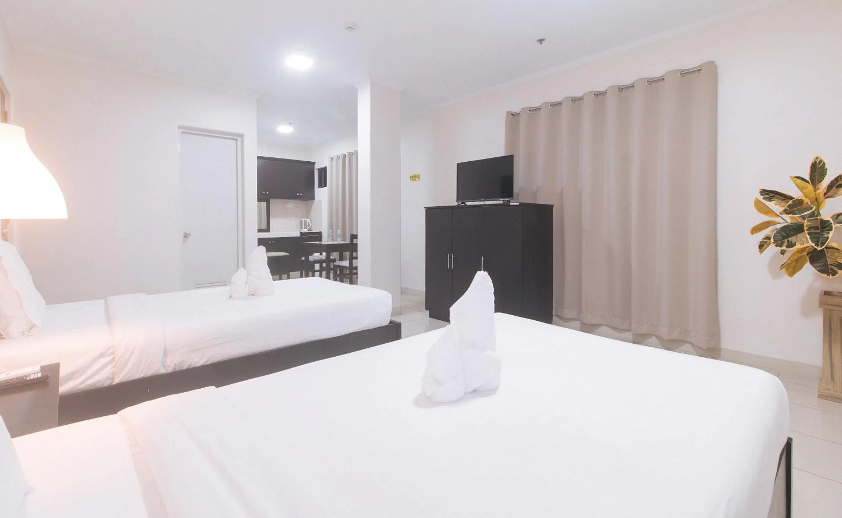 Bedroom, Bed in UrbanView at Evangelista Street Makati