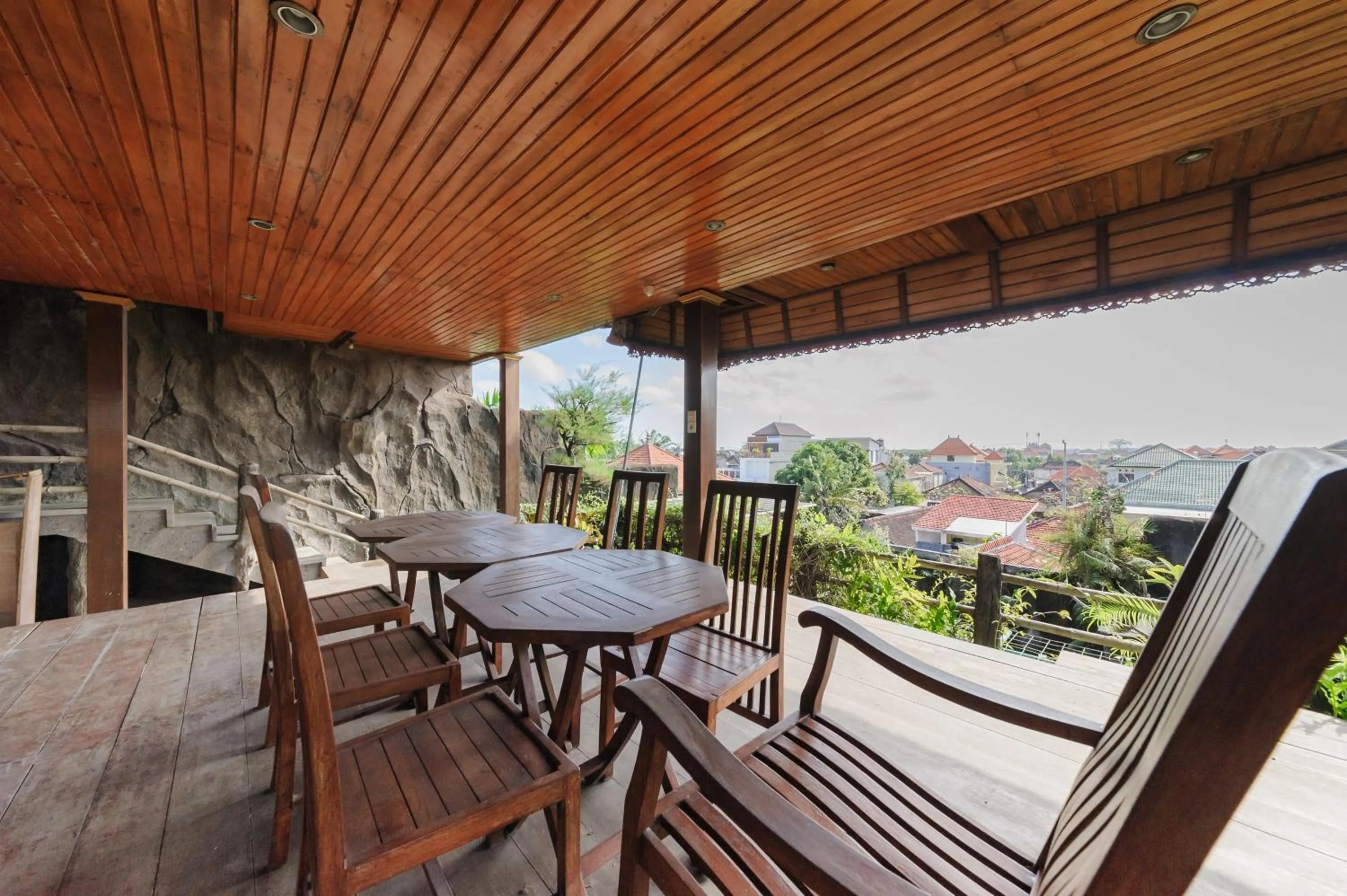 Seating area in Gita Inn Bali RedPartner