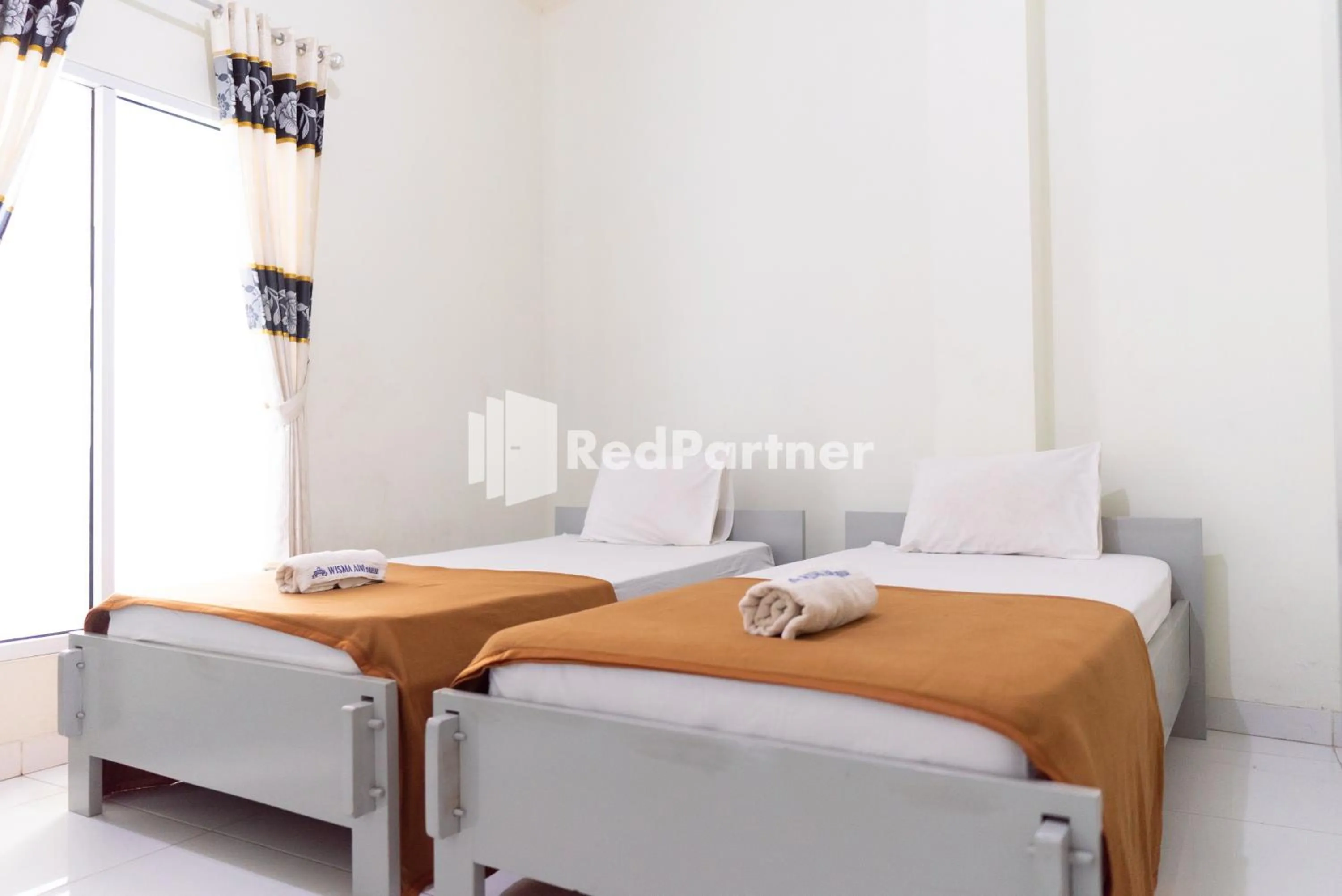 Bedroom, Bed in Wisma Aini Syariah Lampung Mitra RedDoorz