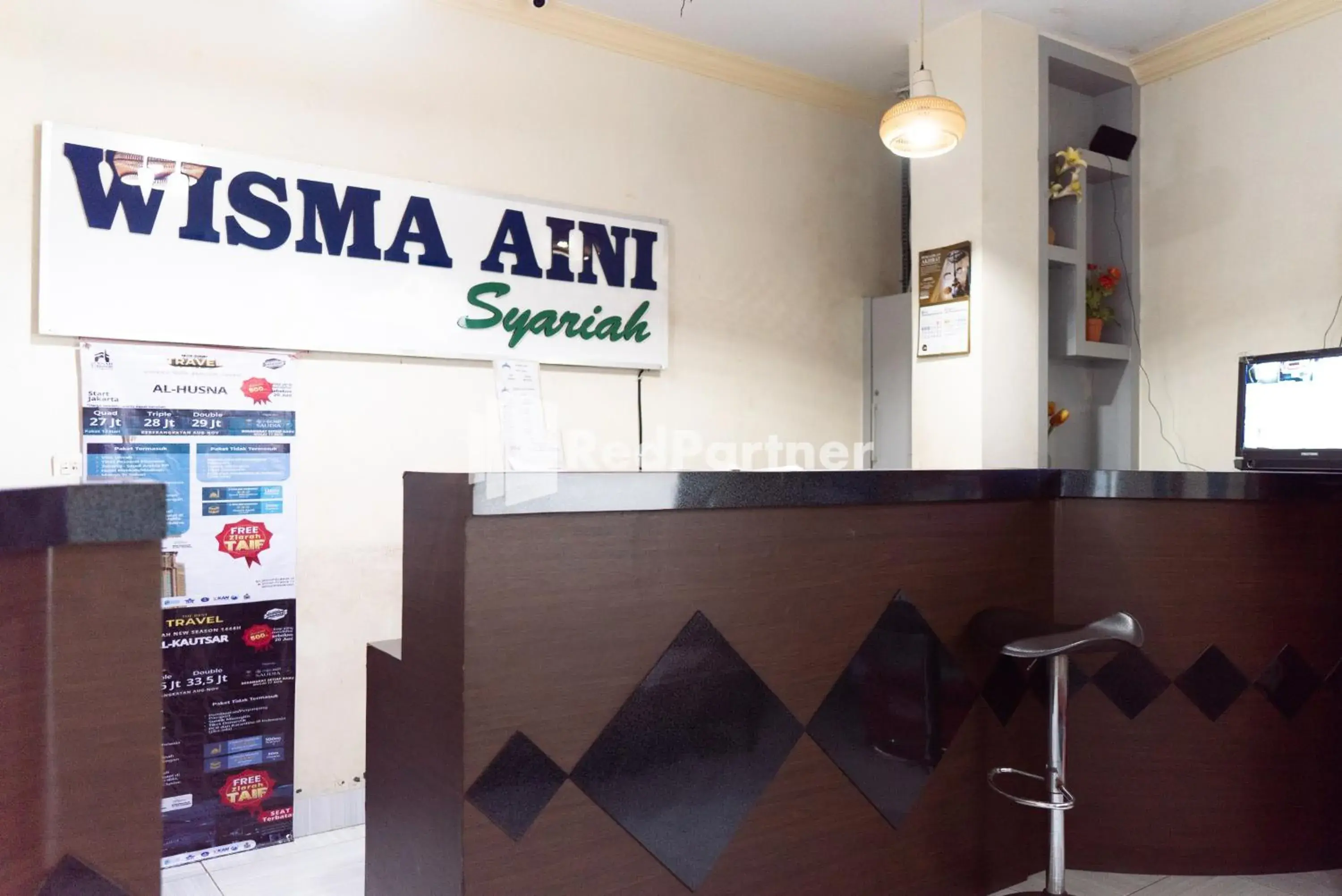Lobby or reception in Wisma Aini Syariah Lampung Mitra RedDoorz Lobby or reception in Wisma Aini Syariah Lampung Mitra RedDoorz