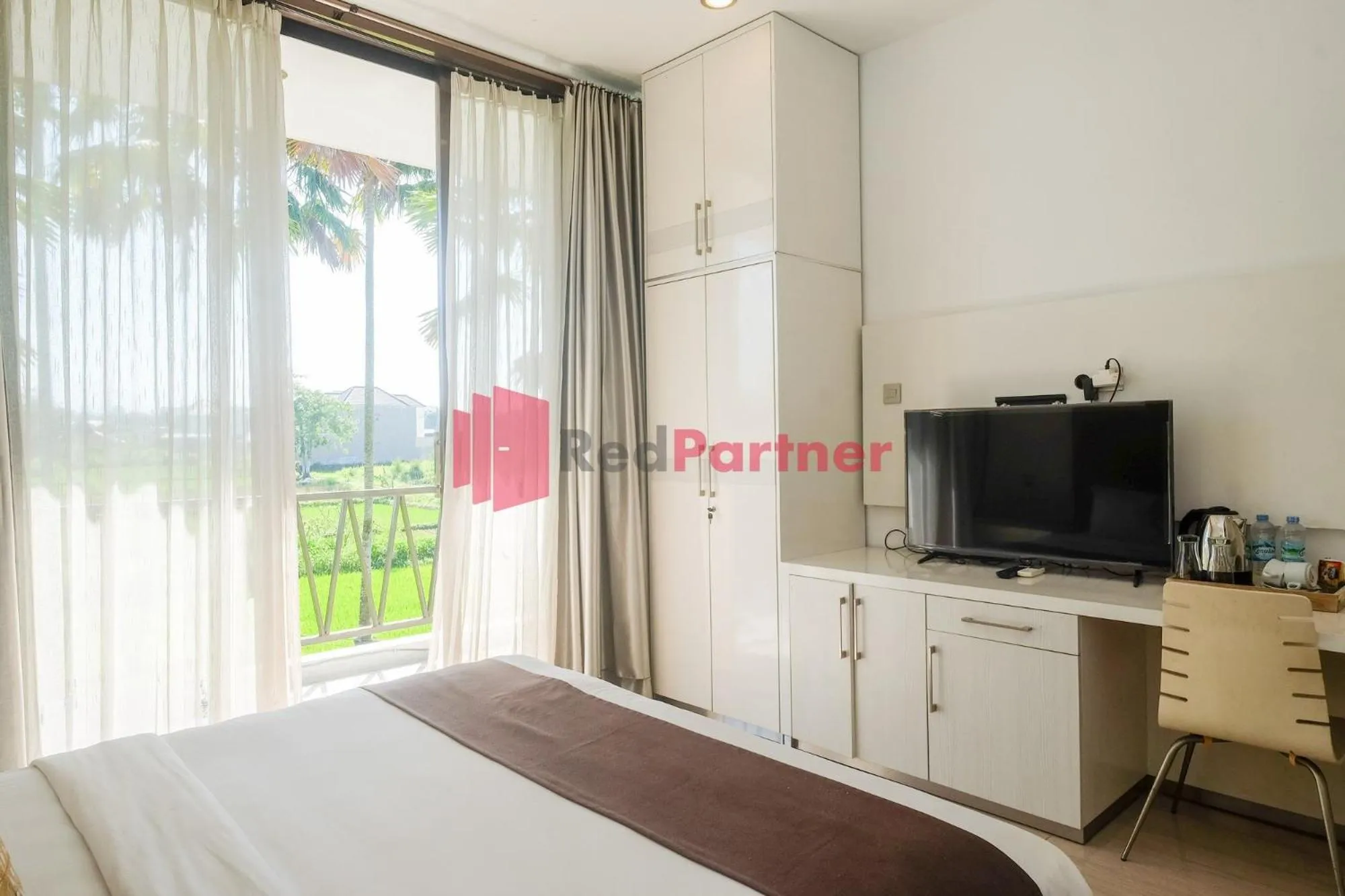 Bed in Sawah Joglo Boutique Villa Mitra RedDoorz