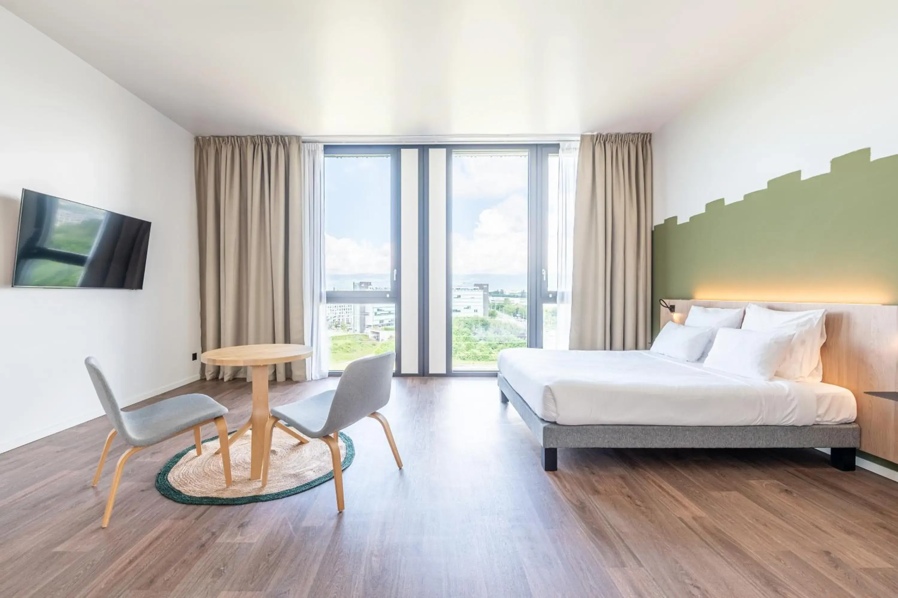 Bed in B&B HOTEL Geneva Airport Bed in B&B HOTEL Geneva Airport