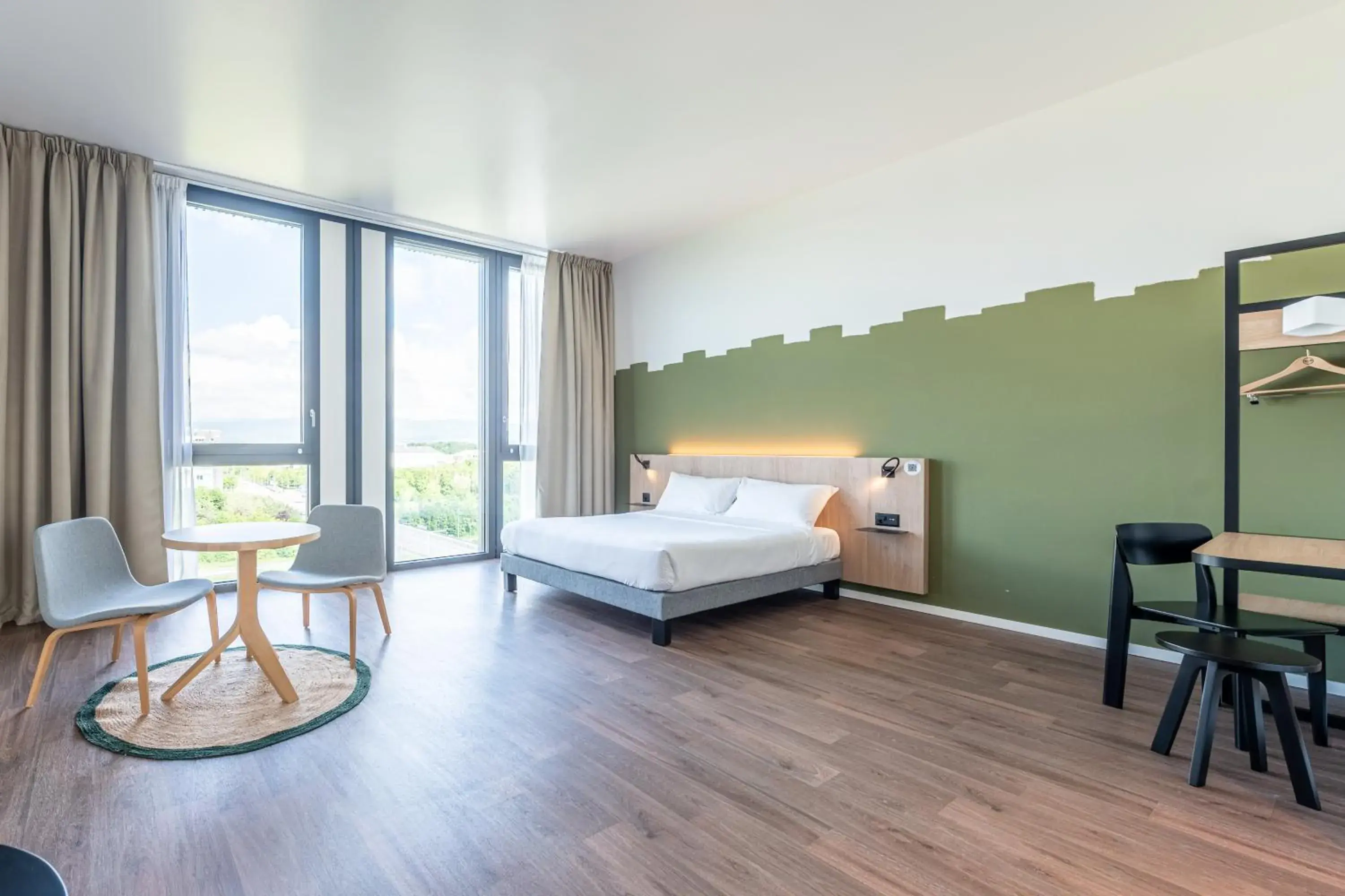 View (from property/room), Bed in B&B HOTEL Geneva Airport View (from property/room), Bed in B&B HOTEL Geneva Airport