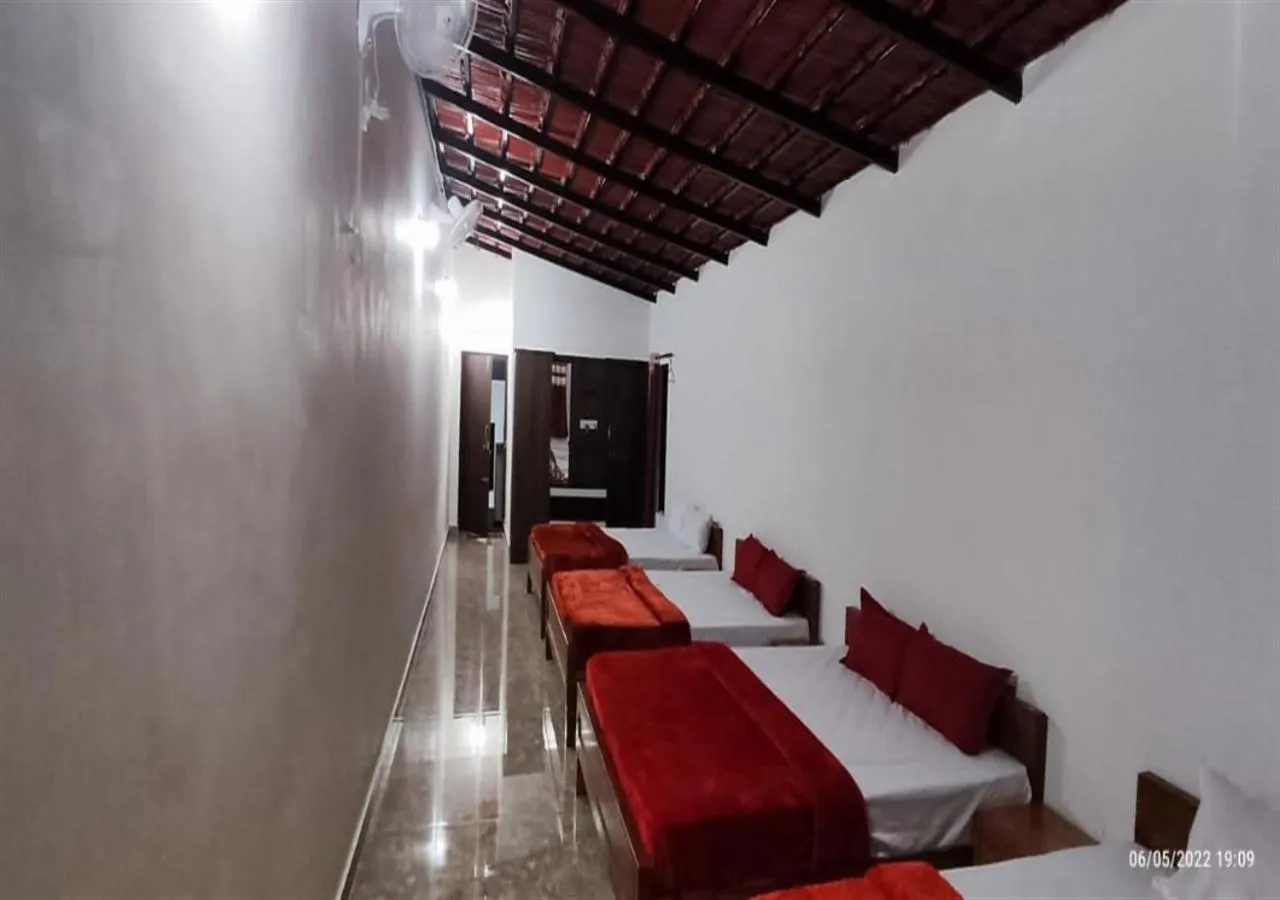 Bed in Orange Valley Plantation Holiday Coorg