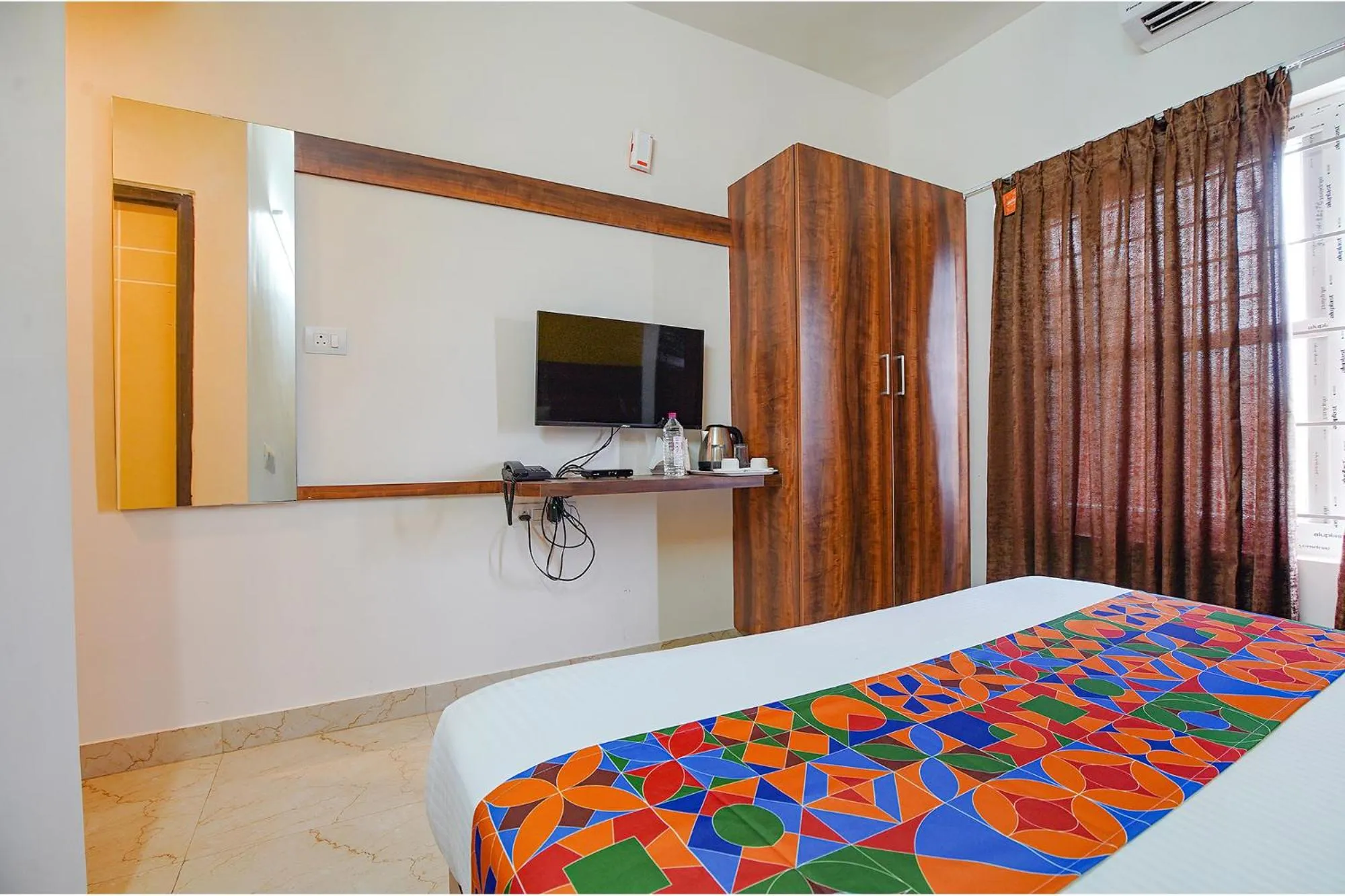 Photo of the whole room, Bed in FabHotel Greenwood Xpress Inn - Nr Manipal Hospital