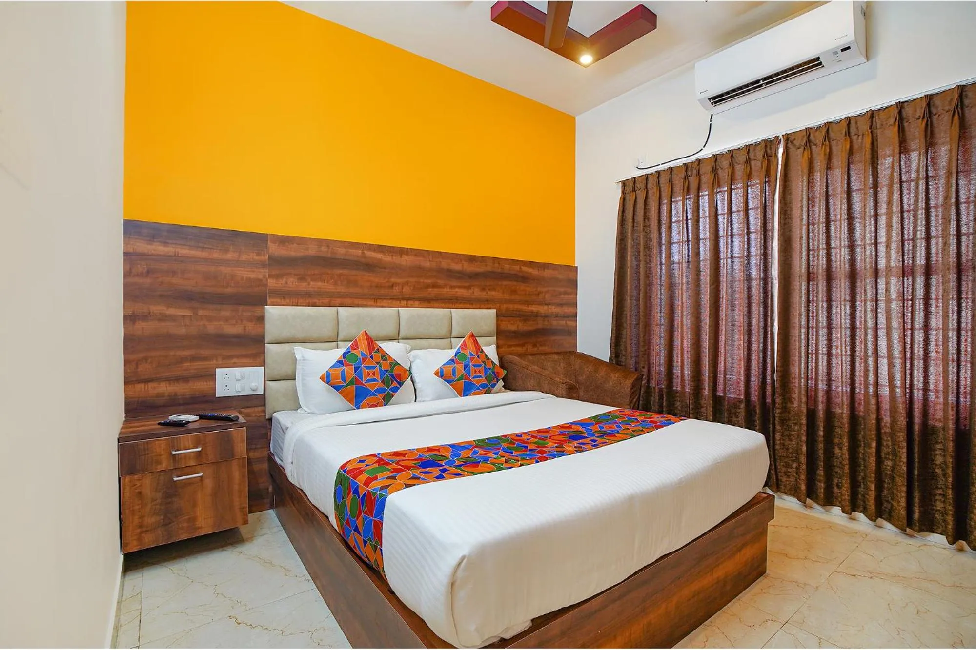 Bed in FabHotel Greenwood Xpress Inn - Nr Manipal Hospital