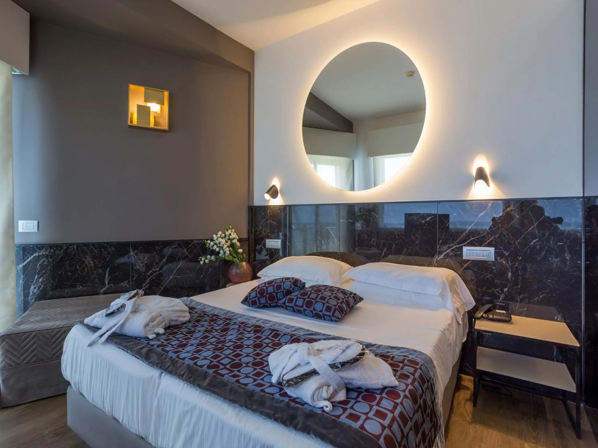 Bed in Hotel Michelangelo