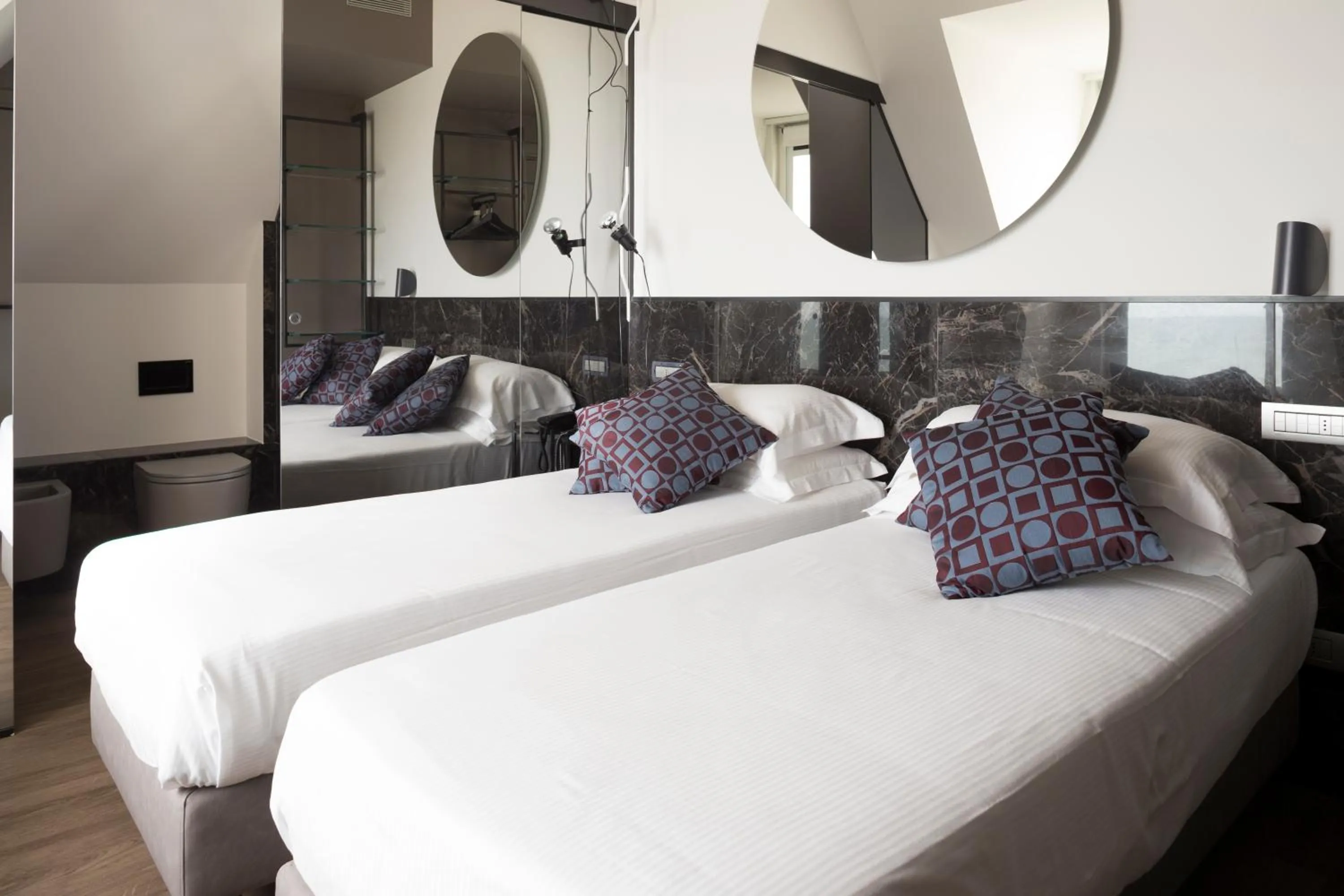 Bed in Hotel Michelangelo